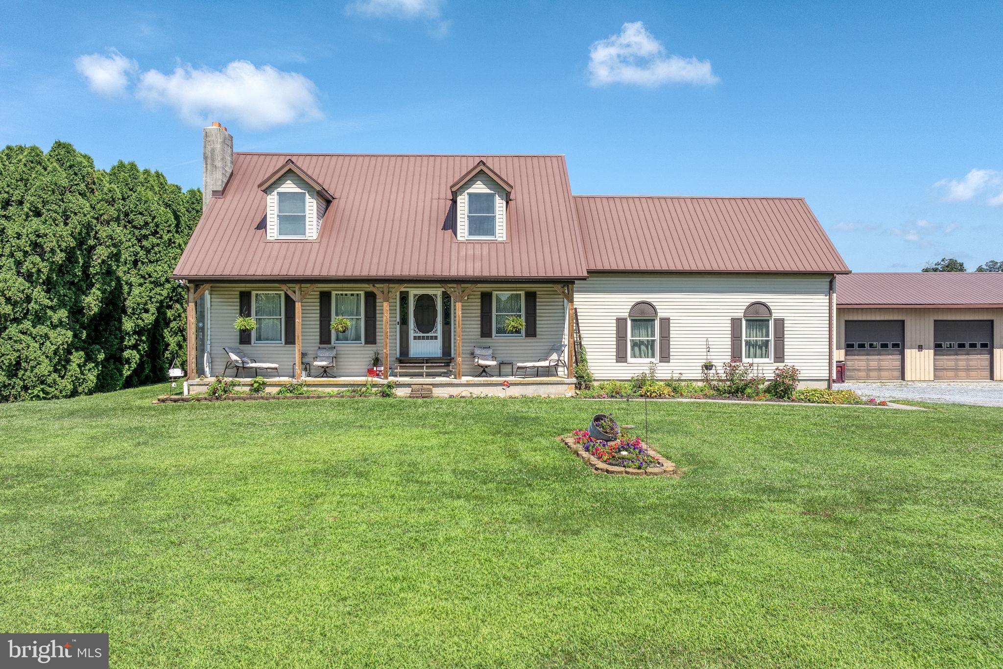 Unique opportunity to own that special property where you can truly do your own thing, whatever that may be! Located on 3.67 level acres in southern York County, this single-owner Cape Cod home is so much more than "just a house." Starting with the fenced pasture and 3-stall barn, there's plenty of room for a few animals. The owners have had a donkey, goats, chickens, and a pig at various times. Can you imagine your own little farm in the back yard?! If fun is the name of your game, there's a huge pole barn in which to store all your toys... and then some! If you want to invite friends and family over, there's plenty of room to entertain on your rear deck and gravel patio area, but there's also a fabulous bar in the pole barn, with its own half bath. I bet you never saw that coming! The house contains 3 bedrooms, 2.5 baths, 2nd floor laundry, family room with stone fireplace, dining, eat-in kitchen, 1st floor office, partly finished basement, and a 2-car garage with 12' ceilings and 9' garage doors - calling all car buffs! House and barn have long-lasting metal roofs, and the HVAC is nearly new. This property is ready for anything!