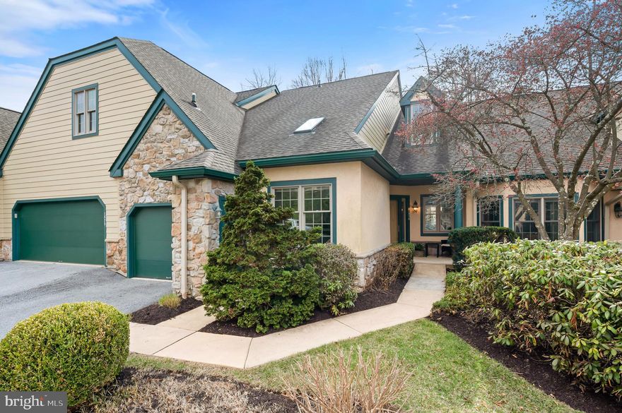 OPEN HOUSE SUNDAY CANCELLED. Welcome to 1376 Springton in the popular Springton Village at Hershey’s Mill. The beautiful, 2 bedroom, 2 full bath townhouse is a perfect one floor living option. This light and bright unit boasts newer wood flooring and has been freshly painted throughout. Enter through the airy foyer to an open floor plan featuring a combo living room and dining room with cozy fireplace and skylight. French doors lead to a sunroom/ 4 seasons room surrounded by windows (which would make a nice office or reading room,) overlooking the 3rd fairway. Sit on the back deck and enjoy the peaceful view! The well-equipped kitchen is open to the breakfast nook with skylight. The primary, main floor bedroom features  vaulted ceiling with skylight, custom built-ins, a double closet and  a walk-in closet with custom closet system, so plenty of storage! The en-suite bathroom boasts newer tile floor an oversized vanity, stall shower with bench and linen closet. The second bedroom is in the front of the house and has a vaulted ceiling with skylight and double window.  A laundry room with access to the attached one-car garage completes the main level. The unfinished lower level provides tons of storage space and many possibilities for finishing if desired. This home features a Geothermal heating system which is one of the best heating systems for reasonable heating/cooling bills. You will love the low-maintenance, turn-key living in Hershey's Mill,  Chester County's most popular Active Adult community, with  a myriad of amenities that include a Community Center, library, walking trails, pool, tennis/pickle ball courts, wood shop, and golf with additional membership.