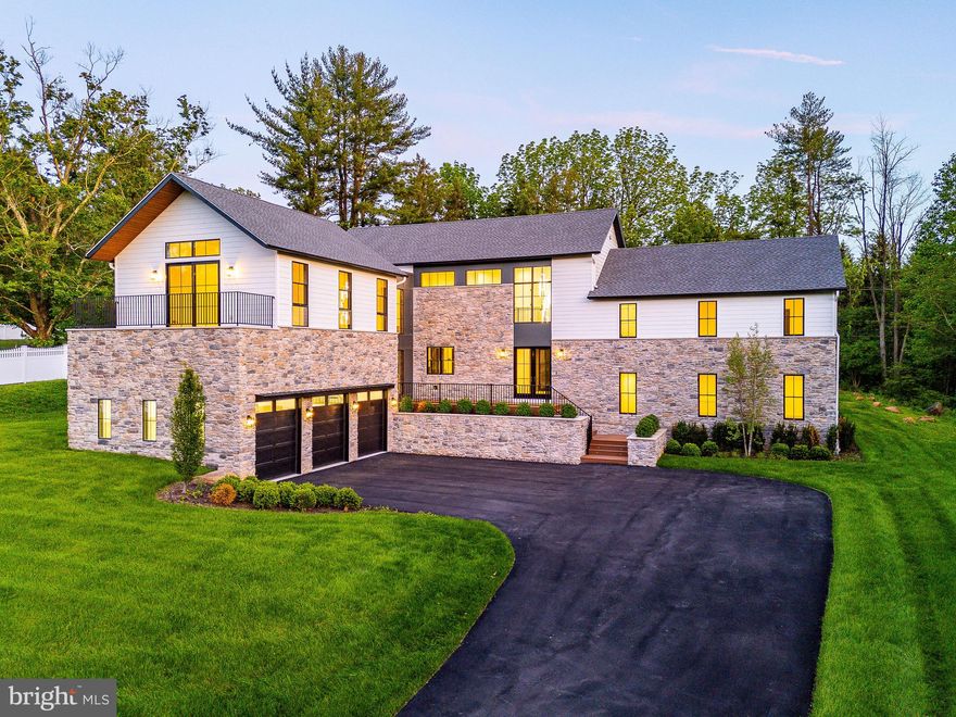 An exceptional opportunity awaits in one of the Main Line’s most coveted neighborhoods. 918 Ethan Allen, built by Zatos Investments, is a striking new construction residence offering a perfect fusion of architectural elegance and innovative design. Located in the heart of Berwyn and within the nationally ranked Tredyffrin-Easttown School District, this thoughtfully designed home delivers over 5,400 square feet of refined living space, including 5 bedrooms, 5 full baths, 1 half bath, and a 3-car garage with additional storage potential.

From the moment you arrive, you’ll be drawn in by the home’s understated sophistication and attention to detail. The main level welcomes you with a spacious, light-filled open layout that flows effortlessly from a sun-drenched living area to a gourmet kitchen equipped with custom white oak cabinetry, quartz countertops, and a professional-grade Wolf appliance suite. A butler’s pantry enhances functionality, while the oversized island and expansive dining space create the perfect backdrop for everyday living and elevated entertaining. Natural light pours in through black-stained Pella Lifestyle windows, highlighting the white oak flooring and showcasing the home’s seamless connection between indoor and outdoor spaces.

The living room, complete with soaring ceilings and a statement fireplace, opens to a covered deck featuring a pergola and outdoor fireplace​, a tranquil retreat designed for year-round enjoyment. Upstairs, the private primary suite offers a serene escape with its custom walk-in closet, spa-inspired bathroom with steam shower and soaking tub, and a terrace overlooking the front lawn. Four additional bedrooms, each with ample storage and en-suite access, along with a loft area and a dedicated laundry room, complete the upper level.​  

The fully finished, walk-out lower level adds incredible versatility​, perfect for a home gym, media room, office, or extended living space. This home also includes zoning approval for a future pool, providing the potential to create a true outdoor sanctuary.

In addition to being in the highly regarded T/E School District, the home is also just minutes from some of the Main Line’s most prestigious private schools, including The Episcopal Academy, The Haverford School, Agnes Irwin, and Malvern Prep​, offering exceptional options for private education within a short drive.

Built for long-term peace of mind, the home comes with a 4-zone HVAC system, 20-year roof warranty, and 1-year builder warranty. Set on a quiet residential street in Berwyn, this location combines suburban tranquility with everyday convenience. You’re minutes from top-rated restaurants like NECTAR, Autograph Brasserie, and White Dog Café, along with access to boutique shopping, fitness studios, major roadways, regional rail, and the King of Prussia Town Center.

918 Ethan Allen represents a rare chance to own a brand-new luxury home in one of the most desirable communities on the Main Line. It’s more than a home​, it’s a lifestyle upgrade. Schedule your private tour today.