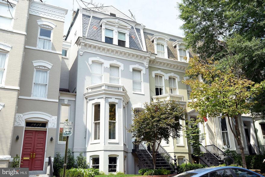 Thoughtfully designed by award-winning architect Robert Gurney, this beautiful and contemporary residence offers approximately 4,300 square feet of living space. This extraordinary 4 story renovation features 4 Bedrooms, 4 bathrooms, and 1 powder room. The main level includes living and dining rooms with 12' high ceilings, beautiful hardwood floors, and a magnificent gas fireplaces with the original marble. The Kitchen features floor to ceiling Hopes windows that showcase an expansive view of the large back garden and capture ample natural light throughout the day. The first upper level features the large Master Bedroom with a wall of custom closets, a gas fireplace, and ebony hardwood floors. In the Master Bathroom, the sink and counters are stainless steel, designed by the architect, and the marble walls and floors from Waterworks create a peaceful retreat augmented by a large freestanding tub and shower. The second upper level includes two additional bedrooms with en-suite bathrooms, as well as a second laundry room. The lower level has two main areas connected by the hallway and wet bar. Immediately down the stairs is a work space with pocket doors, bay windows, a door to the front, a coat closet and a gas fireplace. The wet bar has a Kitchen Aid wine cooler, KitchenAid dishwasher and warming drawer, and Liebherr refrigerator, Caesar stone counters and custom cabinetry. There is also a full bathroom and laundry room with Miele Washer/Dryer on the way to the family room. The family room has floor to ceiling Hopes Windows and access to the backyard. The entire home is centrally wired using the Colorado Vnet System for easy and automatic home control. The guesthouse is accessible from the backyard and features Oak hardwood floors in the lower level living room and an upper level in-law room suite. The property also includes a one car garage located nearby.