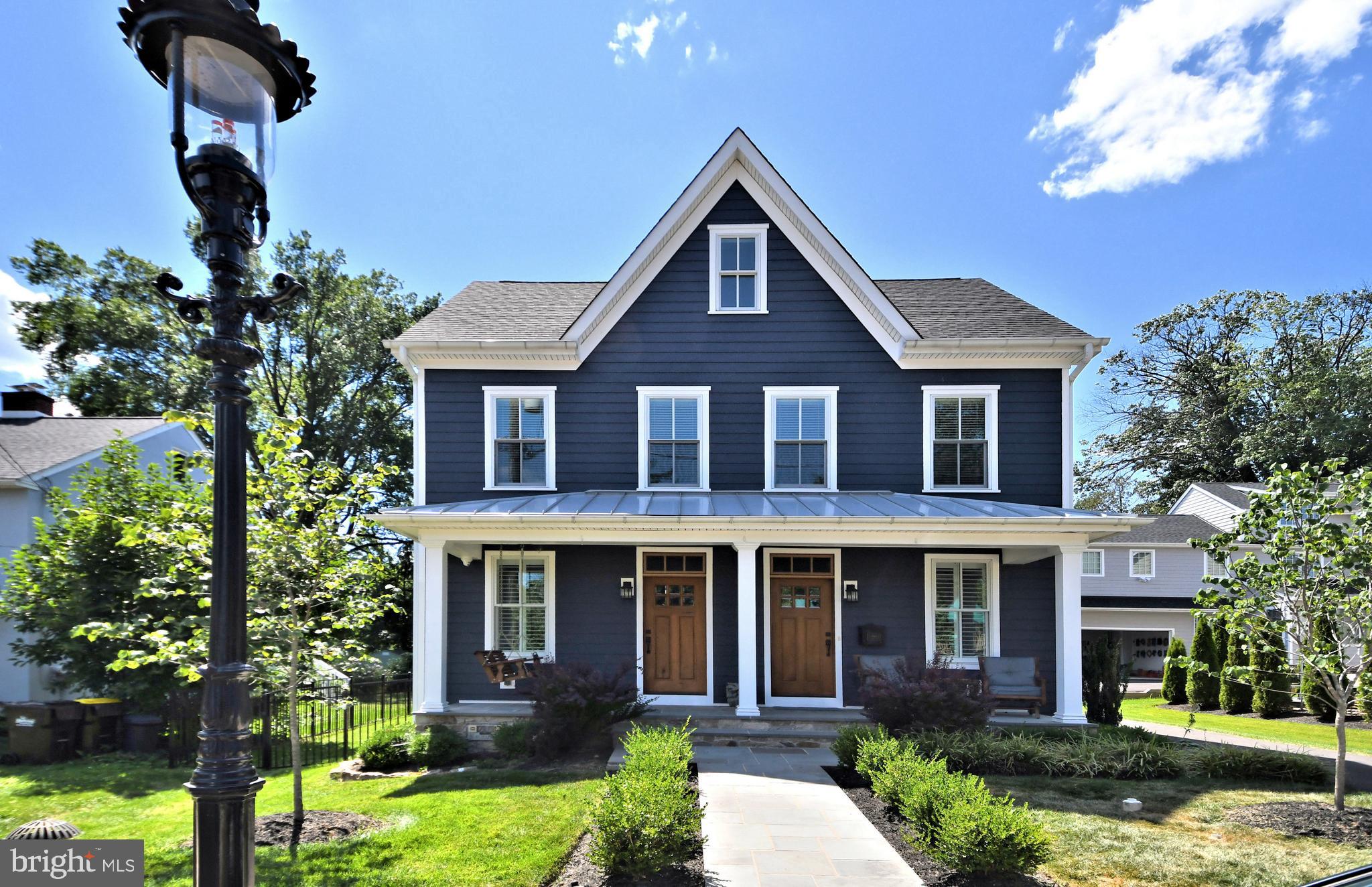 Welcome to 60 South Church Street. Is this the house you thought was a twin? It's a single family with two front doors. Located in the historic district of desirable Doylestown Borough, this 4 year young home sits directly across from Burpee Park. Built in 2018, this home offers 4 spacious bedrooms and 2.5 baths and boasts hardwood floors, recessed lighting and beautiful trim throughout. From a cozy, bluestone full front porch, enter this home through mahogany front doors to a spacious foyer with custom built in lockers and coat closet. This leads to the open floor plan with a family room, kitchen and dining area for great entertaining. The first floor has wood shutters for all window coverings. Foyer, sitting room, hallway, stairwells and second floor hallway have shadow boxing. Kitchen upgrades include a 9.5’ island, quartzite countertops, a built-in beverage center, GE Monogram stainless steel appliances, a Shaw farmhouse sink, a Waterstone bridge faucet and under cabinet lighting. Family room has a coffered ceiling with LED recessed, dimming lights, a custom built mantle above a gas fireplace and surround sound. A separate sitting room offers additional open space or the option for privacy with barn doors. Off the kitchen is a mud room offering additional cabinetry for a food pantry and additional storage. Second floor offers 4 great sized bedrooms with custom built in wood shelving in all closets. Spacious master bedroom offers a very large master closet with custom built in cabinetry. Master bath offers marble floor, marble half wall and fully tiled marble stall shower and a free-standing cast iron tub. And keep your feet warm with the radiant floors. Hall bath offers a fully tiled stall shower and marble floors and countertops. Convenient second floor laundry has plenty of counter space and cabinetry. Enjoy outdoor living space on a patio and/or fire pit area in the fenced in rear yard. Other offerings include a security system with exterior cameras with smoke/carbon monoxide detectors tied into central monitoring, Pella Architect Series windows and additional insulation in the second floor ceiling and attic rafters. There is plenty to see in the energy efficient home in the heart of Doylestown within walking distance to all the Borough has to offer. Schedule your tour today.