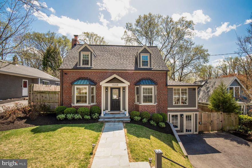 Welcome to 10208 Capital View, step into  a world where impeccable design meets effortless living. This beautifully reimagined  and meticulously maintained Cape Cod style home in the heart of Silver Spring!   A flagstone walkway leads to the inviting front entrance. Inside, gleaming maple hardwood floors flow throughout the first and second levels, adding warmth and character. The living room is a cozy retreat, featuring a wood-burning fireplace with elegant stone-front accents, recessed lighting, and newer replacement windows with stylish window treatments. Upgraded sliding glass doors open to an incredible, private backyard—perfect for relaxing or entertaining.

The main level boasts a spectacular kitchen with Quartz countertops, a peninsula for extra seating, and top-of-the-line KitchenAid stainless steel appliances, including a built-in microwave and gas cooking. Large windows fill the space with natural light, highlighting the crisp white tile backsplash, self-closing cabinets, and recessed lighting. A separate dining area with elegant wainscoting completes the space.

Upstairs, you'll find three generous bedrooms, all featuring three-panel doors with upgraded hardware. The exquisite full bath showcases a glass-door shower and stylish finishes. The entire home has been freshly painted, adding a modern and inviting touch.

The fully finished basement is a standout feature, offering a private suite with its own entrance—perfect as a studio, in-law suite, or rental opportunity. This space includes a large living area, a separate bedroom, an impressive full bathroom, and large hall closets for ample storage. The utility room houses the laundry area and provides convenient walkout access.

Additional upgrades include a fire sprinkler system, an upgraded electrical system, and professionally landscaped grounds featuring a lawn sprinkler system. The large, private backyard is a true oasis with a stone paver patio, a beautiful stone wall, and full fencing for privacy. A spacious driveway accommodates up to four cars.

This home is ideally located just minutes from the Forest Glen Metro, providing easy access to Washington, D.C., and beyond. Enjoy the vibrant offerings of Downtown Silver Spring, featuring top-rated restaurants, shopping, nightlife, and entertainment. Catch a film at the AFI Silver Theatre and Cultural Center, experience live performances at The Fillmore Silver Spring, or explore the area's rich arts and culture scene. Antique lovers will appreciate nearby Antique Row in Kensington, and outdoor enthusiasts can take advantage of the many parks and trails in the area.


This exceptional home seamlessly blends charm, modern upgrades, and unbeatable convenience—don’t miss the opportunity to make it yours!