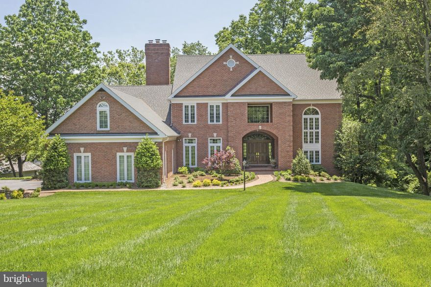 Pristine Stately Brick Manor style home | Sweeping Severn River views |Completely renovated with finest finishes designed by Interior Concepts | Style & refinement in a serene and peaceful setting| Gourmet kitchen w/ sparkling granite  | Relaxing screen porch  | Protected private 90 ft deep water pier | | Excellent Wf value in Prestigious Downs community