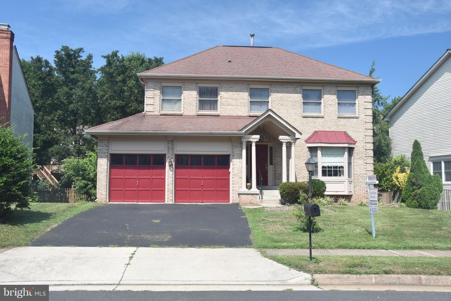 This lovely house is priced to sell! Great location in Chantilly. 4BR 3 1/2 BA, 2 car garage. Spacious Family Room off kitchen with cozy fireplace leading to a nice deck.  Hardwood floors on the first floor, stainless steel appliances, granite countertops. Close to great schools, shopping & more!