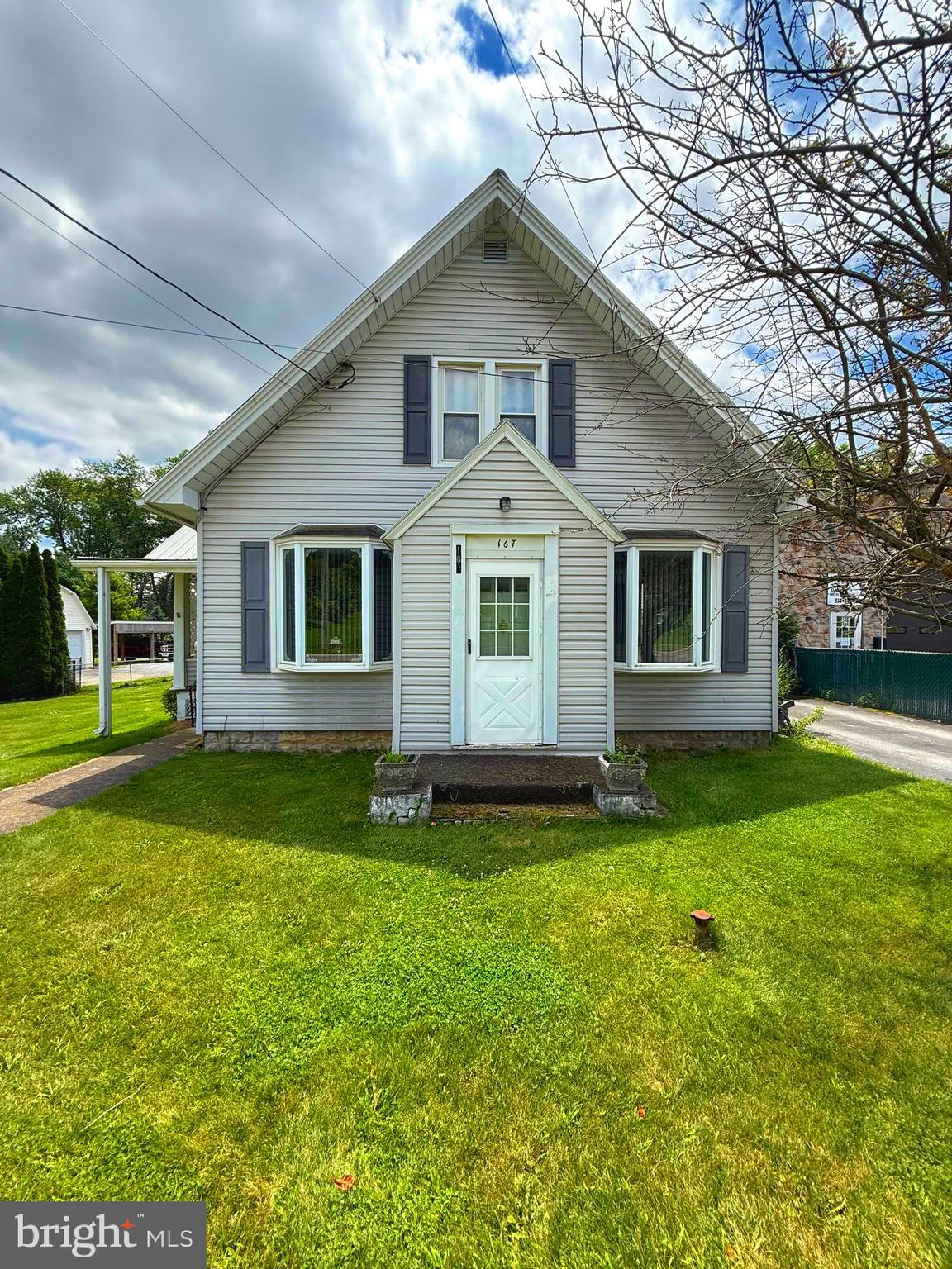 Charming Cape Cod home in historic downtown Millheim! Built in 1915 and refreshed in 2020, this 3‑bed, 1.5‑bath residence offers 1,440 sq ft of living space on a .32‑acre lot. The main level includes a welcoming living room with hardwood floors, a remodeled bedroom with half bath, a large dining area, and a country kitchen with pantry and abundant cabinets. Upstairs, enjoy two sizable bedrooms, updated full bath, and a bonus/media room. Outside, relax on the large deck or covered patio, ideal for grilling or adding a hot tub. The shed could be used as a workshop or to provide extra storage. Ceiling fans, double‑hung windows, and fiber‑optic service round out the package at this adorable property. Minutes to local shops and Penns Creek, and in the Penns Valley Area School District. Don’t miss this delightful blend of space, comfort, and character!