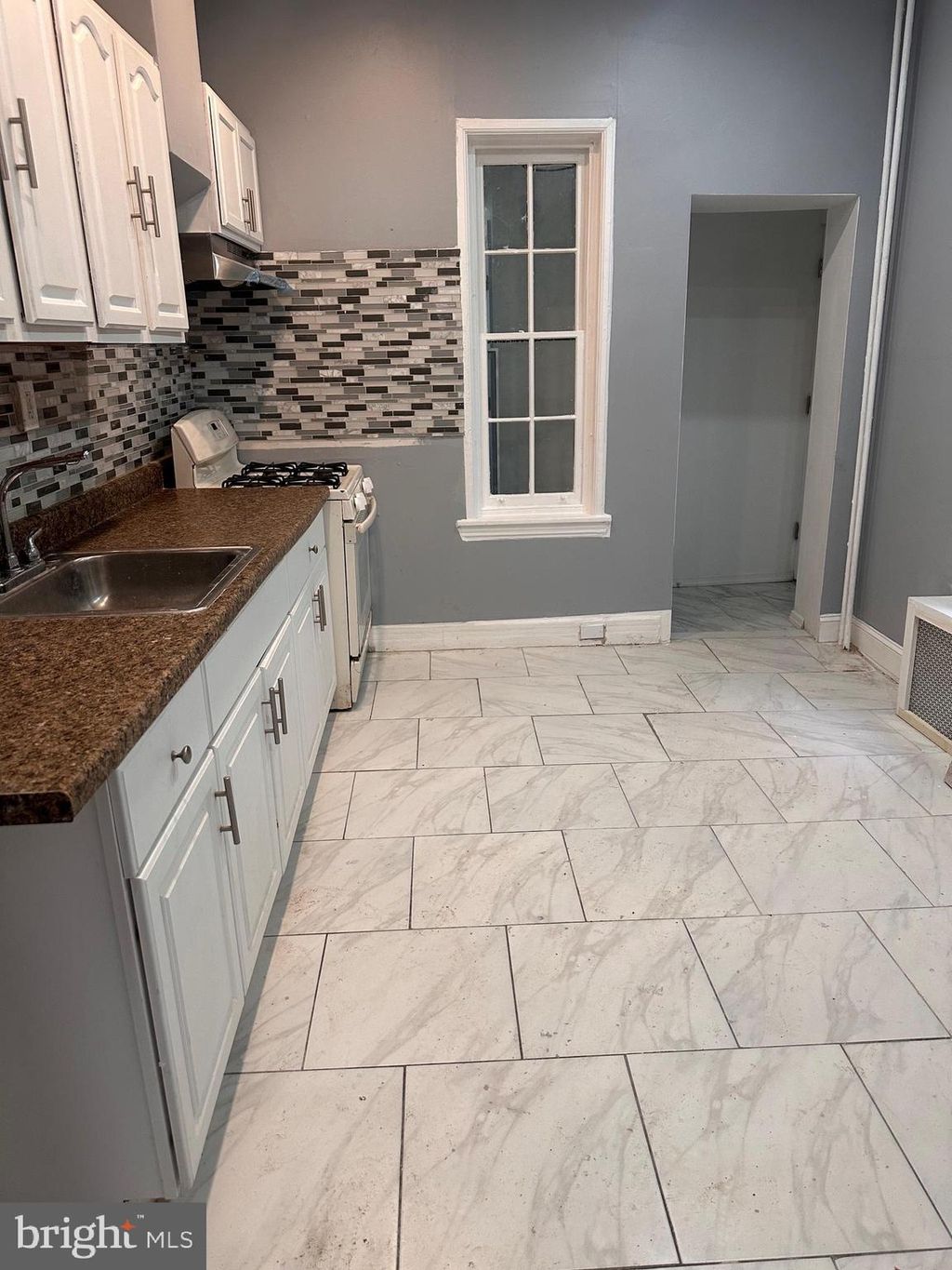Photo of 2343 N Woodstock Street, PHILADELPHIA, PA 19132 (MLS # PAPH2539094)