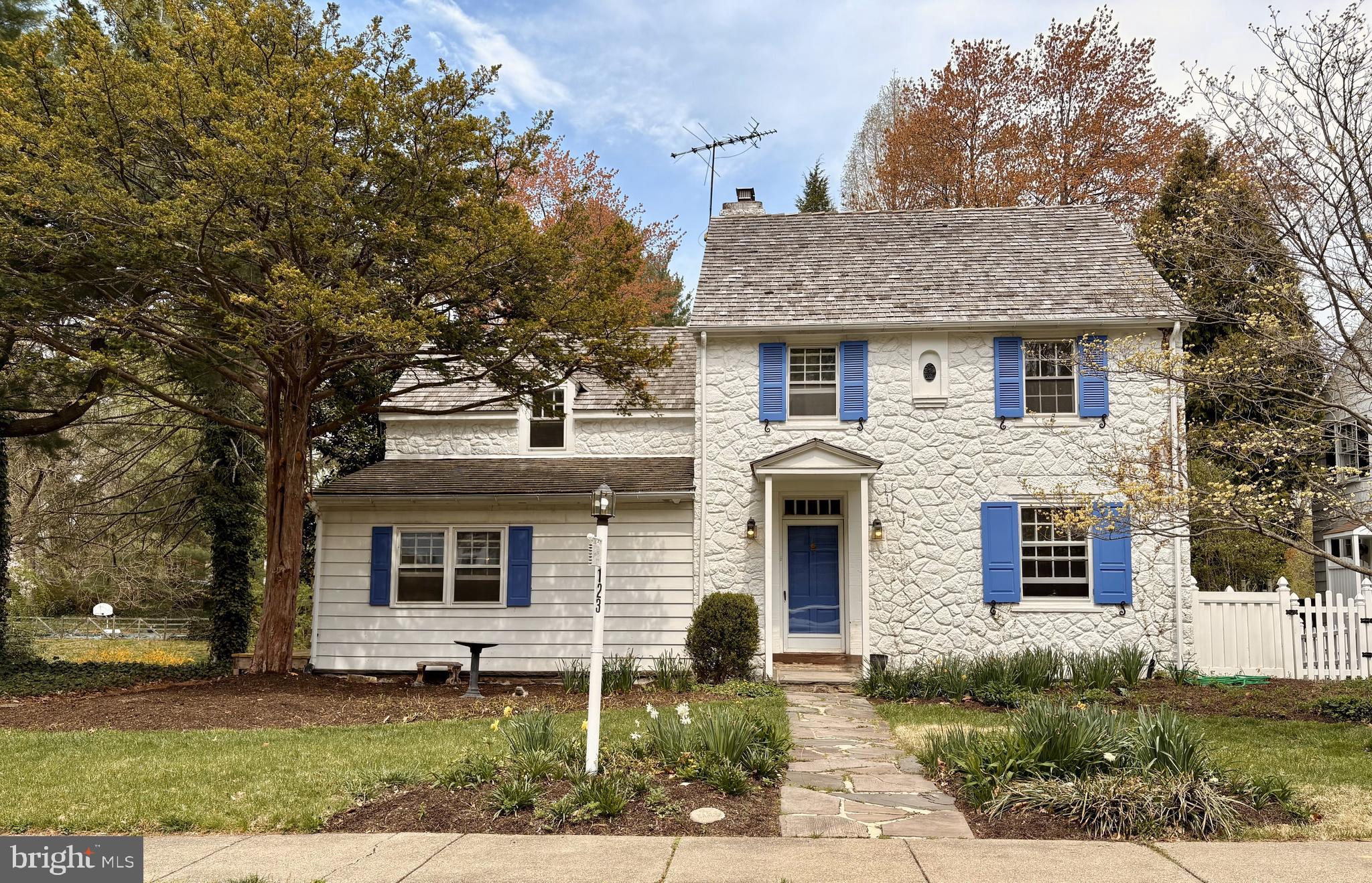 Garden Brook Estate has been returned to its original glory! Bright perennials dot the lawn of this four-level single-family home. The original craftsmanship and structure of this all-stone house stands out even among the charming and well-kept properties on the block.
When you enter the spacious foyer, you’ll be stunned by the gorgeous original wide-panel hardwood floors. Pass through the formal dining room with custom built-ins and vintage chandelier on your way to the brand new kitchen with granite countertops and high-end appliances. On the other side of this level is an oversized living room with wood burning fire place and built-in bookshelves. A powder room (half bath) and bonus room perfect for an office, cocktail space, or mudroom complete this floor.
On the next level you will find 3 comfortably sized bedrooms with ample closet space and brand new carpets. The two full bathrooms (including an en-suite) have been completely remodeled, save for the vintage original tile with bullnose surround. Upstairs, you will find a forth-level bedroom or “bonus room” with skylight and built in desk space, as well as another half bathroom!
Before you go, don’t forget to visit the lowest level of your future home, with another wood burning fireplace! This level also offers an appliance room and walk-out / ground-level access to your amazing backyard. Situated along one of the coziest and safest stretches of Wyncote’s coveted Waverly Road, this property offers a full third-acre of yard space. A peaceful stream marks the end of the property, right where a hidden trailhead to acres of nature preserve picks up. Previous owner built custom retaining / flood wall - one of the only creek-side houses on the strip to offer such protection. They also put in an impeccable cedar roof just 7-8 years ago.
The current owners have put their heart and soul into rejuvenating this home and cannot wait for you to see it!