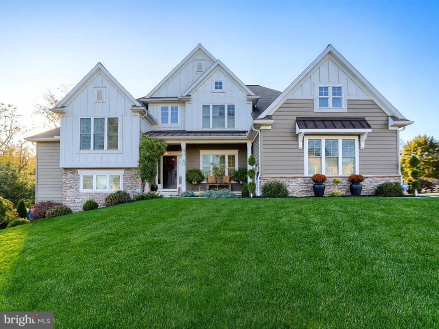 Welcome to the Preserve at Simmons Creek, a stunning Craftsman-style home with stone and hardiplank nestled on over an acre of beautifully landscaped wooded backdrop. This five-bedroom, three-and-a-half-bath home exudes warmth, character, and timeless design — the perfect blend of comfort and sophistication. Step inside to find vaulted ceilings and rich hardwood floors that flow throughout the main living spaces. The open-concept kitchen is an entertainer’s dream, featuring a large oversized island, designer lighting, and a built-in bar just off the kitchen — perfect for cozy fall gatherings or morning coffee chats on the covered deck. The primary suite on the first floor offers a peaceful escape with spa-like finishes, custom walk-in closet, while the expansive windows frame views of the picturesque backyard that feels like your own private resort. Follow stoned pathways leading to a salt water jacuzzi, surrounded by mature trees — including a graceful weeping willow that sways with every autumn breeze. The backyard also features an enchanting English garden house with beautiful wisteria...ideal for potting, gardening, or enjoying a quiet afternoon by the fire pit. Upstairs, you’ll find three additional bedrooms offering plenty of space for family, guests, or creative use. The unfinished basement is a blank canvas, ready to become your future dream walkout basement — think home theater, gym, or recreational room.  Additionally, an oversized 3 car garage with side entrance for easy access to the adorable mudroom. Whether you’re sipping cider by the fire pit or hosting friends in the bar off the kitchen, this home captures the heart of fall — and the essence of timeless living.