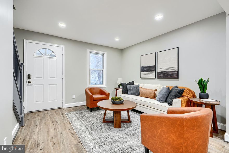 Welcome to 272 Saint Helena, a recently updated townhome in the desirable Saint Helena area of Dundalk. This move-in-ready home features two bedrooms and one full bath with LVP flooring throughout and a fresh neutral color palette. Enter through a bonus covered front porch allowing tons of natural light into well-defined living and dining areas that flow seamlessly into the rear kitchen. The kitchen features modern grey shaker cabinetry, stainless steel accents, a brand-new appliance package, single deep sink with gooseneck faucet, and convenient main-level laundry. Upstairs you’ll find 2 nicely sized bedrooms with along with a brand-new full bathroom showcasing a beautiful tile surround, stainless steel faucets, new vanity, updated lighting, and mirror. The partially finished basement provides valuable additional living space perfect for a third bedroom, office, or rec room. Step outside to enjoy the brand-new rear deck with vinyl railing, private parking pad, and fully fenced front and rear yards—ideal for pets or entertaining. Conveniently located with easy access to I-95 and the heart of downtown Dundalk. Schedule your showing today!