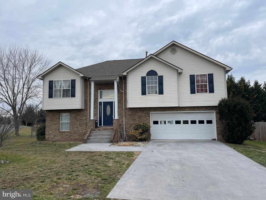 This big split foyer is in a quiet cul-de-sac location, with easy access to Fairfax Pike and I-81.   The whole main level is freshly painted, including all trim.  This unique floorplan offers a living room with vaulted ceilings that connect to the eat-in kitchen.  The kitchen's eating area has French doors that lead out to the deck. On the other side is another room that can be used as a den, office, or formal dining room.  Down the hall are two secondary bedrooms that share a hall bathroom, and the spacious master bedroom is complete with a walk-in closet and its own attached bathroom. The finished walk-out basement has a large family room, laundry, another bedroom, and a full bathroom. The fully fenced yard offers plenty of room to entertain friends - not to mention the refinished and repainted deck off the dining room that adds another entertainment area for your family!