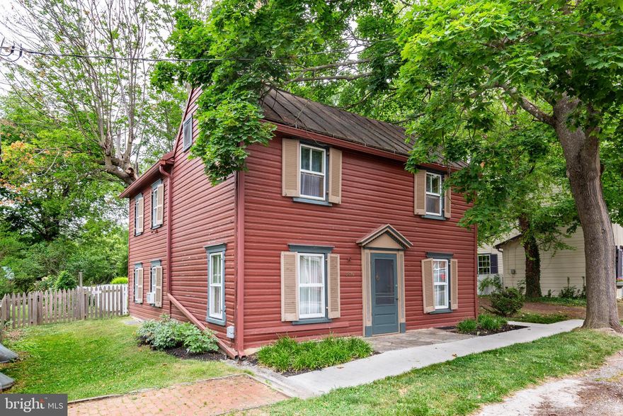 Seller having new metal roof installed! Oh this home makes me so EXCITED!!!! Built in 1843, the original structure was a log cabin and then in later years it was covered with German Lap siding and as the years passed (late 1800's) , an addition was added. This home has the charm and character from years ago and has been featured on Christmas tours and Garden Tours over the years. The foundation is stone with single swing wood exterior exit door at side screened patio; basement floor is concrete & the major home components are located in the basement to include laundry facility, furnace, and pressure tank. On the main level...a large, spacious family room with built in bookshelves and brick fireplace (working) along with french doors lead to the side screened in patio, kitchen and dining room are open in design and there is also a door leading to the side patio as well. The upper level features 3 bedrooms and an area (landing) which could be an office, den, or play area, a full bath that is updated too. Our Sellers have loved this home for 40 years...you will see. Other fantastic features...hardwood floors through the entire home, newly installed breaker panel, well pressure tank installed in 2021, and partially wood picket fenced rear yard. As I mentioned before....this home was featured on a Garden Tour and is adorned with gardens galore. So step outside and enjoy the history and love that has surrounded this home for almost 200 years.....You will not be disappointed :)