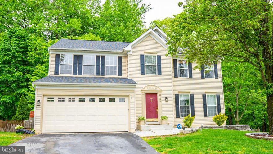 Love all around this amazing single family home in Manassas Park.  5 Bedroom, 3 Full Baths, and a powder room, hardwood floors on main and upper level. updated kitchen center island enough space for breakfast area.  Amazing family room,  a  separate formal dining and a powder room.  Large  owners suite with gorgeous view  walk-in closet, spacious bedrooms for everyone, four upper level.   Fully finished lower level, newly carpeted  stairs bedroom/office, full bath, and sliding doors walk out to the beautiful fenced backyard.  They are not making anymore earth, this home has a large backyard great foe those who love the woods and privacy.   two car garage. WASHER AND DRYER DO NOT CONVEY