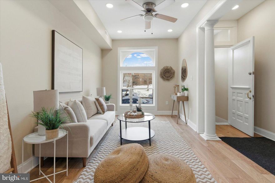 Visit this beautiful, high-end renovation of a large, 2-bedroom, 2-full-bath home, ideally located in the Broadway East community.  This home sits directly across from the wide-open spaces of  Collington  Square Park and the Collington Square Recreation Center.
As you enter, you will be amazed by the beauty of the luxury oak plank hardwood flooring that you will find throughout the home.  A few steps more, you will notice high ceilings and a huge, open floor plan highlighted by a formal family room with floor-to-ceiling pillars that enhance the room's luxurious feel.  Modern ceiling fans and recessed lighting in every room.  Step through your separate dining room to a gigantic, eat-in Kitchen with ceramic tile flooring,  tons of cabinet space,  one-of-a-kind, grey swirled granite counters, and brand-new high-end stainless steel appliances.  Imagine the food, family, and memories you will make here!  
Step out back to your private, covered deck overlooking your fenced rear yard.  Perfect for entertaining, enjoying your morning coffee, or relaxing with a cocktail in the evening.
You will notice the attention to detail and custom finishes throughout that you will not find in any other home! Brand-new, energy-efficient windows, surrounded by custom, rounded woodwork, ushers in wonderful sunshine and keeps out the cold.  Wonderful!
Upstairs, you will step through your private seating area or office into your large Master Bedroom, with an ensuite custom-tiled bathroom.  Second floor Laundry Room for convenience.   Custom Skylight brings ample natural light to this wide-open space.   Second Full bathroom with custom tile and another skylight that brightens your space with even more natural light.  The rear bedroom features a huge closet and a custom bookshelf.  The large basement has brand new HVAC with Central Air and features tall ceilings.  Plenty of room for storage.   As a bonus, ask about the Seller partially finishing  the basement or adding a 3rd. bedroom, at his cost, if you wish.  Seller help with closing costs is possible, as well.    Need more parking?  See picture of large parking lot in the rear of the home.
This wonderful home can be yours in plenty of time for Spring.  Come visit, and you will fall in love and call it Home!