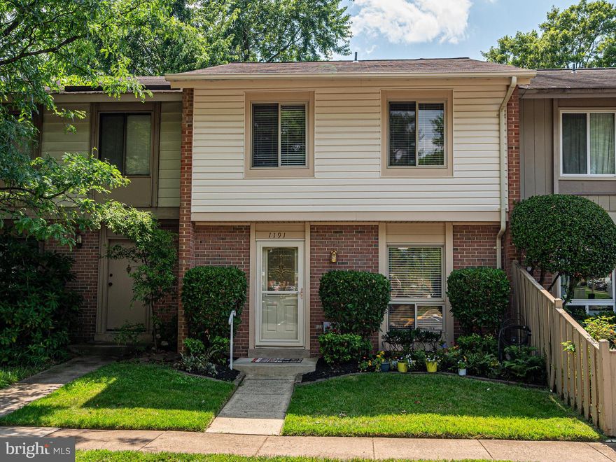 ***Seller has received multiple offers above list price***Beautifully maintained, updated and upgraded too!  Light and bright with step saving kitchen, ample counter and cabinet space including extra drawers and pullouts.  Dining room with chair rail, living room and bedrooms with crown molding.  Six panel doors and wood trim.  Bathrooms with ceramic tile, main level with engineered hardwood flooring, hardwood stairs, upper level hall and bedrooms.  Ceiling fan lights in living room and all bedrooms.  Walk-in storage area with shelving on main level.   Spacious primary bedroom with walk-in closet and direct access to full bath.  Pull downstairs in upper hall to attic storage.    Privately fenced back yard with platform deck, shed and garden area backing to parkland with playground nearby and walkway to neighborhood pool, tennis, club house, ball field and another playground.  Great location with easy access to bus, metro and shopping, airport and commuter routes.  Plentiful parking with 2 assigned spaces in from (#69) and multiple visitor spots too.