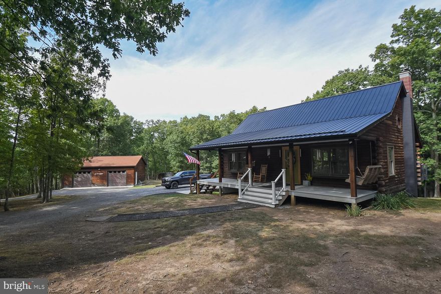 You won't want to miss this immaculate well maintained log home in the highly desirable Taylor Lake Subdivision! The precise attention to detail and craftsmanship with updated appliances and features set this home apart from the rest, not to mention on 9 +/- acres with lake access! This captivating move in ready home offers 2 bedrooms with 1.5 baths. An existing room in the basement makes for the perfect spare room or office space. But, that's not all, there's still enough space in the basement to add an additional room or use as a rec area. The possibilities are endless here! Enjoy the peace and quiet of country living at it's finest! The back deck or front porch make for the perfect oasis to enjoy a morning cup of coffee surrounded by nature.  Need a large garage to store your vehicles, use as a workshop, or as storage? This one has that too! All these qualities are a rare gem in this highly sought after subdivision! Lets not forget some big ticket items are already done for you like the new metal roof, seamless gutters, appliances, HVAC, and hot water heater! This home offers enough space that it could be an entertainers paradise! This property has it all, from a sloping yard with wooded acreage to a small creek that runs through the woods. Properties like this aren’t available too often, and this one is the perfect slice of almost heaven West Virginia! Don't sleep on this one, schedule your appointment today!