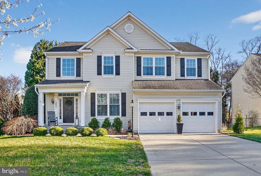 Welcome to 2801 Carver Road, a beautifully maintained home in the highly sought-after Chapman Farm community of Crofton. This home offers a bright, open layout with rich hardwood flooring throughout the main level, abundant natural light, and a seamless flow ideal for both everyday living and entertaining. The updated kitchen features quartz countertops, white cabinetry, subway tile backsplash, stainless steel appliances, and a center island, opening to a sun-filled breakfast area with direct access to the rear deck. The adjacent family room is warm and inviting, highlighted by a gas fireplace and walls of windows. A separate formal dining room with updated lighting and a spacious living room provide additional gathering spaces on the main level.  Upstairs, hardwood flooring continues throughout, enhancing the home’s cohesive feel. The primary suite offers a spacious retreat with a vaulted ceiling, large walk-in closet, and a beautifully updated en-suite bath featuring a double vanity, soaking tub, and separate glass-enclosed shower. Additional bedrooms are generously sized with excellent natural light and flexibility for guest rooms or home office space. A well-appointed hall bathroom with updated finishes completes the upper level. The fully finished lower level expands the home’s versatility with a large recreation area ideal for entertaining, a dedicated media/lounge space, a flexible bonus room perfect for a home office or guest space, and a full bathroom.  Outdoor living is enhanced by a rear deck overlooking a backyard lined with mature Leyland cypress trees, providing added privacy and a peaceful setting. Chapman Farm residents enjoy access to community amenities including the clubhouse, tennis courts, pickleball courts, walking trails, and a tot lot. Conveniently located near Crofton schools, shopping, dining, and major commuter routes, this home offers the perfect combination of space, updates, and location. Professional photos and 3D Matterport tour will be uploaded by Friday.