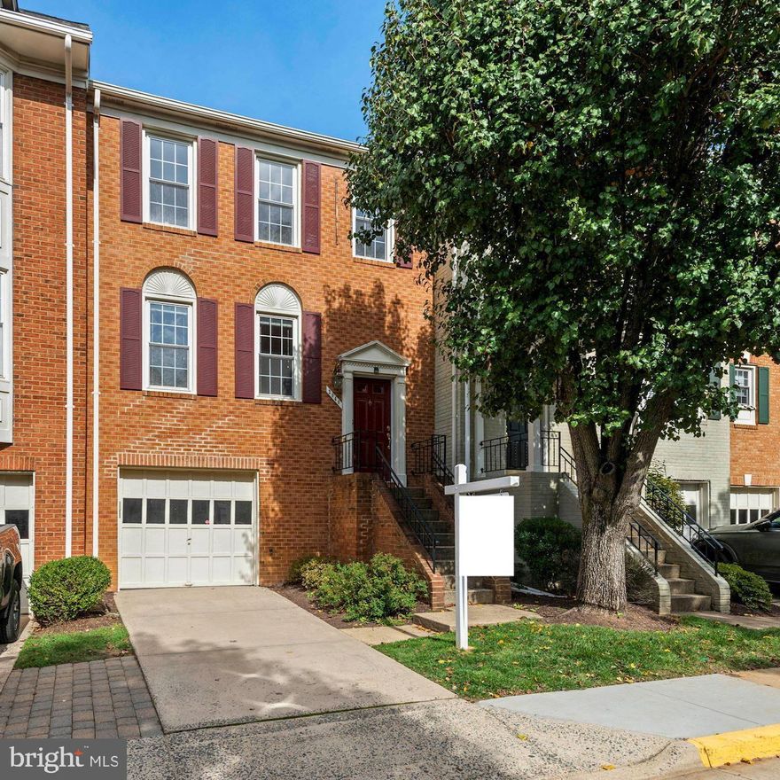 PRICED TO SELL! Move in ready townhome in the heart of Tysons Corner with nearly 2000 sqft of living space (see floor plan)!  Meticulously maintained 3BR/2FB/2HB three level home w/ garage and charming deck and yard. Main level and upper level offer pristine hardwood floors, kitchen w/ island, endless counter space, and stainless steel appliances, sun-soaked living room, and separate dining room to host dinners. Kitchen leads to deck overlooking patio and yard perfect for dining al fresco and hosting gatherings. Primary suite with copious closet space and spacious ensuite bath with dual vanities. Head down to the walkout lower level w/ fireplace and numerous storage options including large storage room, laundry area, and access to the garage. Commuting is a breeze with 495, 66, and major thoroughfares located minutes away. Shopper's paradise with Tysons Corner Mall and Tysons Galleria located within walking distance! Truly a showstopper property!