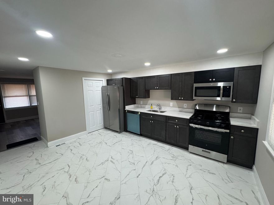 Recently Updated*** Interior Row/Townhouse with 3 Bedrooms, 2 Full Baths located in Eastwood Heights. Spacious living area, Kitchen with Stainless Steel Appliances, Fresh paint, New Electrical lights & Fixtures, updated bath. New flooring throughout the house, Front/Rear Porch, Deck, outside entrance fully finished basement with laundry area, and a fenced backyard.