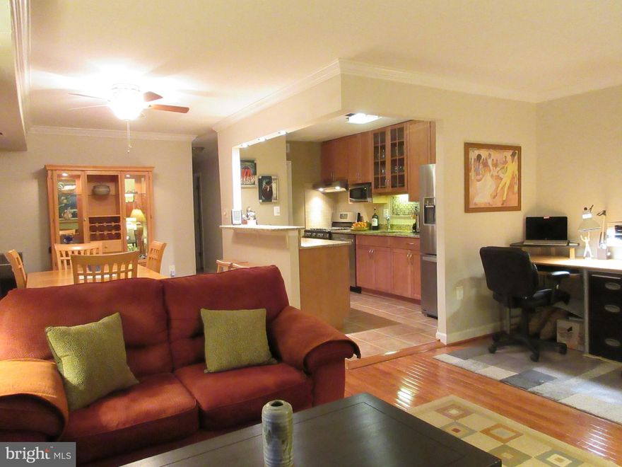 Very convenient location and  condo fee includes all utilities (except cable). Beautiful  2 bedroom condo in Bethesda Park with open floor plan. Updated and very well maintained with modern finishes. Warm granite counter tops with full length cabinets. Stainless steel appliances with 5 burner stove, tile flooring and eat in bar top with recessed lighting. Modern updated bathroom with porcelain tile throughout and  granite vanity top. Wood floors in living areas and carpeted bedrooms. Light colors and crown molding throughout with large windows and 11' foot balcony door lets in lots of natural light.  Window and door treatments include blinds and drapes. Tiled entry foyer with coat and shoe closet. Nicely finished utility closet with built in cabinet and shelves. Condo fee INCLUDES ALL UTILITIES (except cable). All of this is in a convenient and location between Twinbrook and White Flint Metros as well as bus lines. Easy access to 270 and 495 Minutes from Pike and Rose and close to shopping, restaurants, bars and grocery stores. Harris Teeter, Giant and Safeway very nearby as well as Lotte and Megamart. Condo fee includes pool, tot lots, tennis courts and parking. Backs up to Rock Creek Park and hiking and biking trails. Walk to Montgomery County community garden. Don't miss this one.