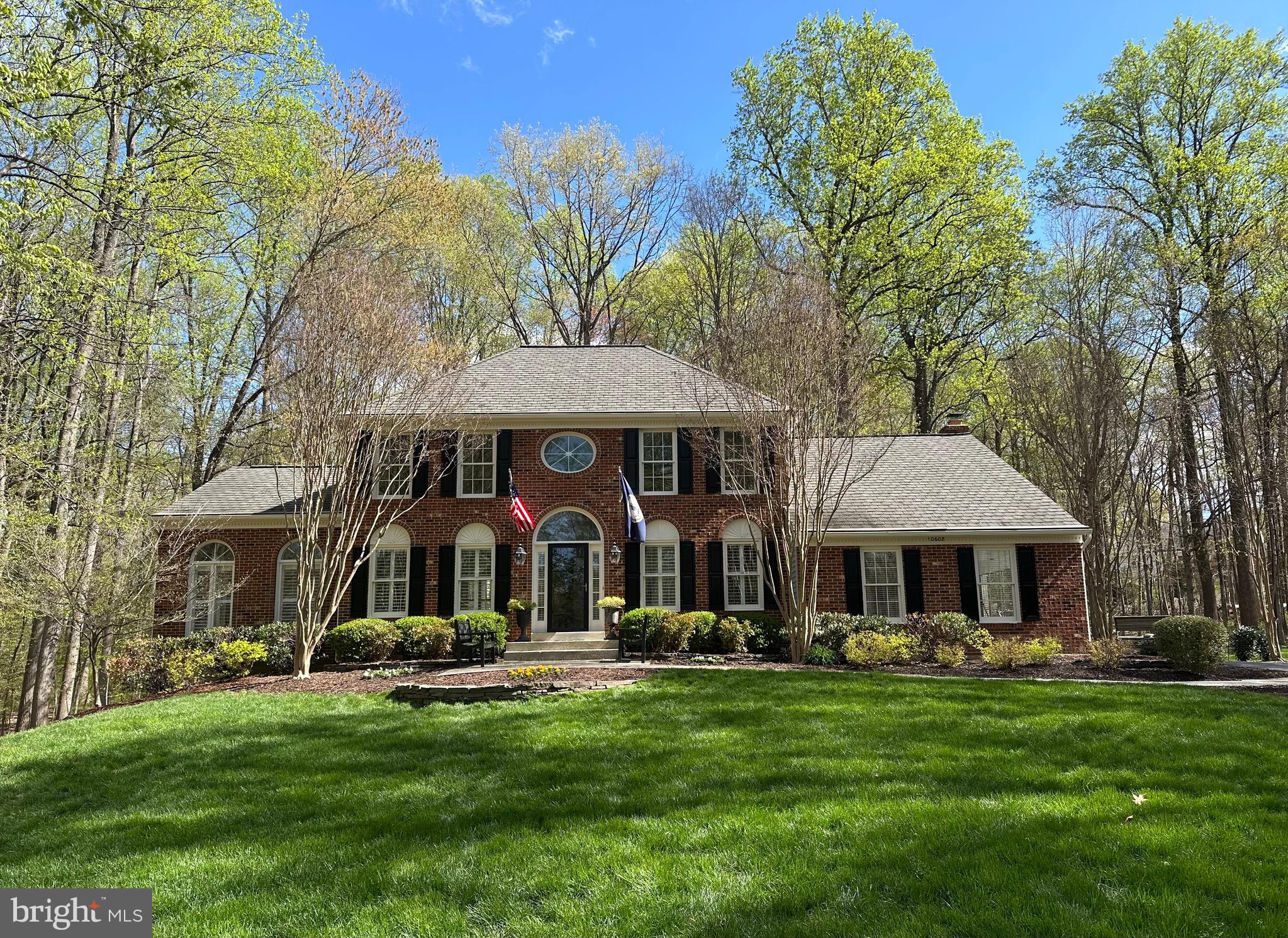 Welcome Home! This is your rare opportunity to own such a beautiful, classic Virginia colonial nestled on 2 acres in the heart of Fairfax Station. Additional 1.35 acres of adjoining wooded HOA land really lends a park-like estate setting. ** Stately brick front NV Homes Chapel Hill model with side-load garage and sunroom elevation. ** Turning into the driveway, your first impression curb appeal and approach sight line is simply grand, with a gradual rise up through the trees to your secluded oasis! You and your guests will immediately consider this the finest lot in the neighborhood! ** Generous extra parking capacity! ** 4 bedrooms, 2 full bathrooms on the upper level; spacious main level includes an office, a large sunroom / conservatory / playroom, and kitchen & family room overlooking a large deck, gazebo, and wooded lot. ** Lower level is perfect for entertaining and awaits your further vision. ** Enjoy the peace! Enjoy the privacy! Enjoy walks/jogs on the South Run Stream Valley Wooded Trail located within the neighborhood. ** Enjoy the convenience of shopping and dining nearby. **