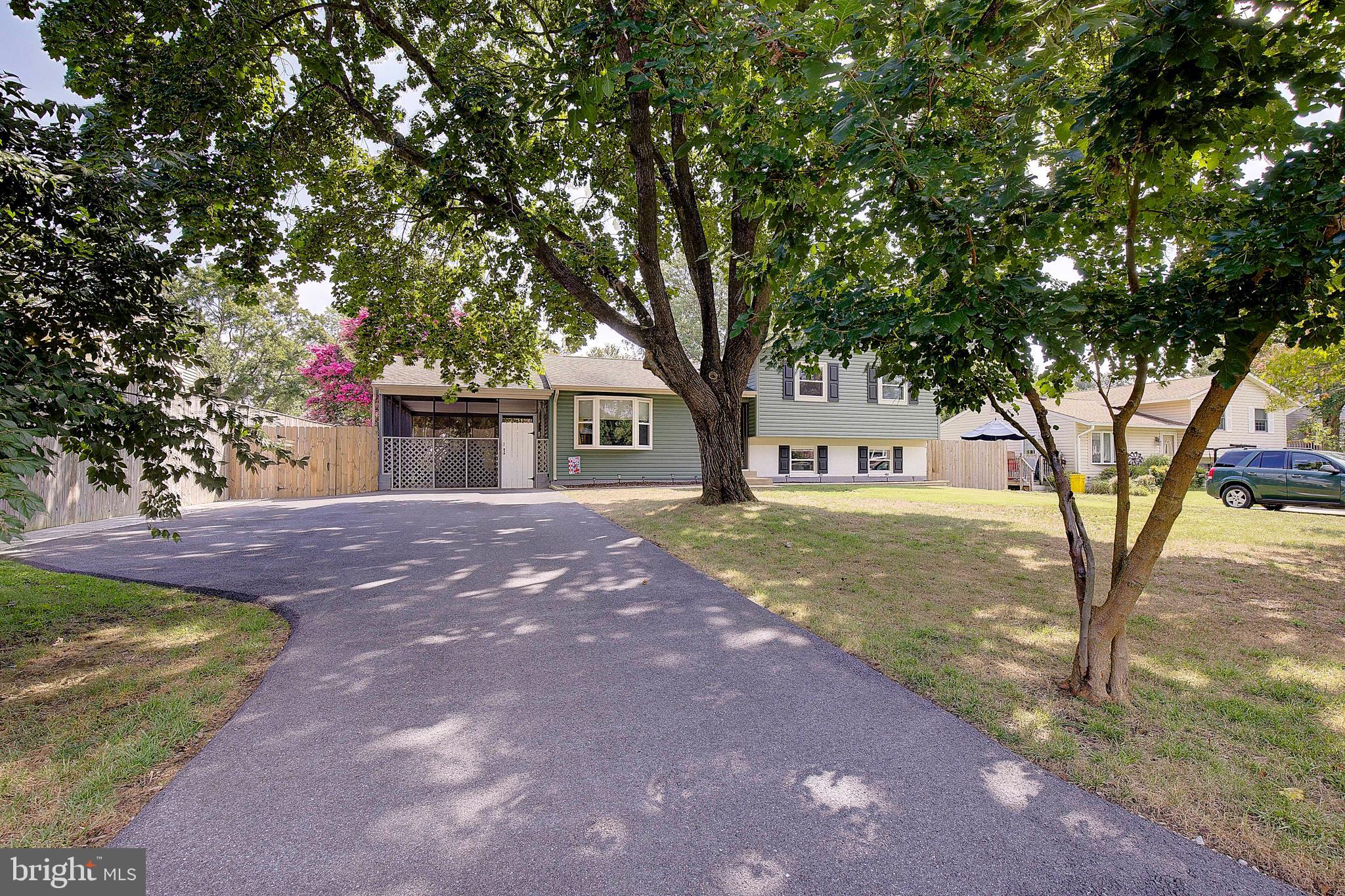Welcome to 3033 Marlin Drive, a charming home tucked away in the desirable Riva Farms community just minutes from Annapolis. Set on a flat lot with a fully fenced backyard, this property offers both privacy and space for outdoor enjoyment. A screened-in side porch provides the perfect spot to relax, while the backyard, complete with a large composite deck, paver walkway, firepit area, and spacious shed create an ideal setting for entertaining or unwinding. Inside, the remodeled kitchen features quartz countertops, extra cabinetry, and luxury vinyl tile flooring that flows through the main living areas. The home offers four bedrooms and two full, remodeled bathrooms upstairs, providing comfortable accommodations for family or guests. Oh and plenty of storage - a whole encapsulated crawl space, ready for your off-season clothes and holiday decorations! Vinyl siding has been replaced for a fresh, low-maintenance exterior, and the oversized driveway provides ample off-street parking with additional street parking available for gatherings. Wait until you see your low electric bills - currently they are around $140 per month because of the Solar Panels (owned, not leased!). You'll also enjoy top rated schools including Central Elementary, Central Middle and South River High School! With its peaceful setting, functional updates, and close proximity to shopping, dining, and all the activities Annapolis has to offer, this home is ready to welcome its next owner. You're going to love living here!