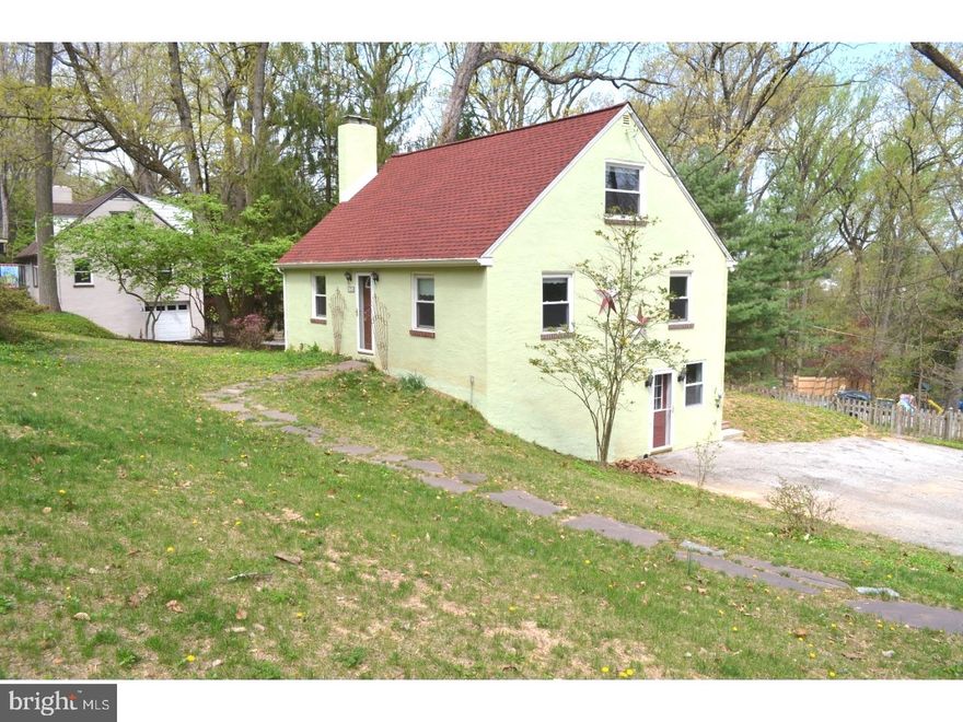 Location! Location! Location! The appeal of small; the impact of big. Enter into the Living room with stone fireplace. The Dining room and Kitchen are open to each other. From the kitchen you can access a large premium composite deck overlooking the fenced yard. The master bedroom and 2nd Bedroom/Office are also on the first floor.  The bathroom is updated with a solid surface tub enclosure and vintage ceramic.  Upstairs has 2 more large Bedrooms.  The walk out basement has a great workshop,Powder room, laundry room, and Family room. This wood workers cottage shows beautiful hardwood floors, extensive moldings, solid oak wood doors, and is much larger than it appears.