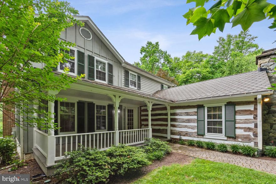 A classic farmhouse colonial featuring a 'log-cabin' style family room w authentic exposed wood beams, hardwoods floors and a cozy stone fireplace!  Light and bright, freshly painted.  House is set back significantly from Old Dominion, on a bucolic  2 acre lot!  Mature trees abound, along with yard areas for play.  Main level deck (partially covered) overlooks in-ground pool!  Primary suite w vaulted ceilings, his & hers walk in closets, soaking tub w jets.  Separate dining room, study, and living room w fireplace - all with hardwood flooring.  Full finished basement w plenty of light.  Back up generator, well filtration system.  Feeds to Spring Hill, Cooper & Langley  public schools.  **A REAL VALUE**
