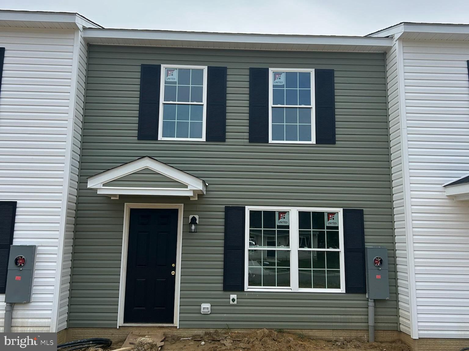 Brand new home in Historic Chestertown available for move-in this spring. This home features luxury vinyl plank flooring throughout, a spacious living room, eat-in kitchen with white shaker cabinets, granite countertops, and stainless steel appliances, plus a covered patio off the kitchen for outdoor enjoyment. Upstairs you’ll find generously sized bedrooms including a large primary suite with walk-in closet and private bath. Additional highlights include exclusive financing opportunities with zero down payment loans, paid closing cost programs, and discounted interest rates—making it possible to own this home for less than area rents. Delivered at the asking price as shown in the photos, this home combines modern style, comfort, and convenience in one of Chestertown’s most historic locations.