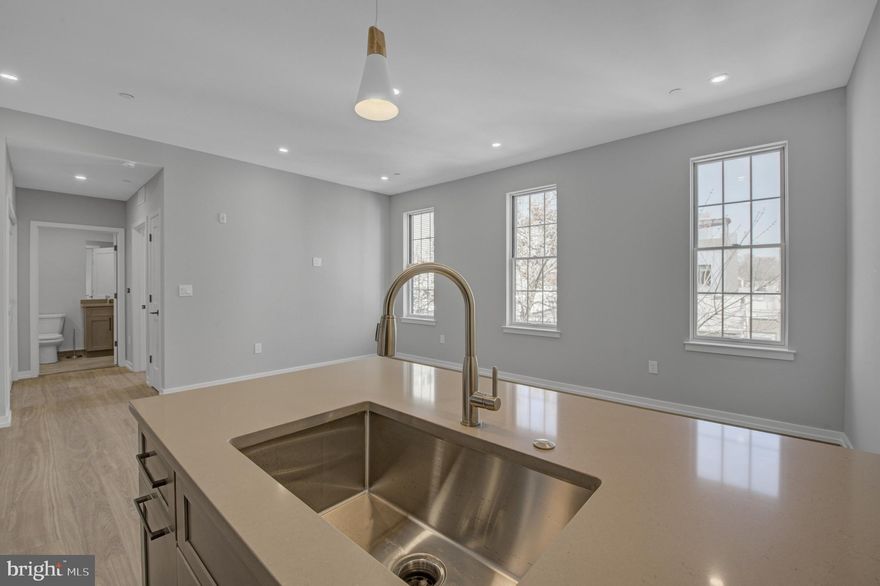 Welcome to Innovator Village, nestled in the heart of Graduate Hospital! This gated community is home to 82 brand new construction, luxury units featuring top of the line finishes. 2445 Innovator Way offers everything you could desire in a city apartment and can be moved into immediately. This unit features a spacious, open living room with huge windows and lovely natural light, a kitchen with quartz countertops and stainless steel appliances, a beautiful bathroom, hardwood floors and an in unit washer/dryer. The building features a shared roof deck with beautiful views of Center City. Innovator Village is located on the bustling Washington Ave corridor with easy access to Drexel University, CHOP, Penn University, I76, restaurants, shops, public transportation and much more! On site parking is available for lease for $300/month (currently none available; short waitlist).