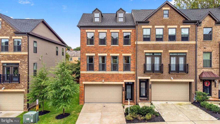 Well-appointed 2-car garage luxury end townhome, 4 bedrooms, 3.5 bathrooms (Approx. 2900 sq. ft.) in a prime location and the convenient community of Metro Row — just blocks to the Vienna metro station and a short walk to the nearby Pan Am shopping center. This home is in like-new condition. Smart locks provide convenient keyless entry into the home using pin codes. Beautiful kitchen with a massive island, upgraded tile backsplash, cabinetry, and stainless-steel gourmet appliance package.. Overlooking a quiet wooded area, the covered porch features sliders, a gas fireplace, and plenty of space for outdoor entertaining and relaxing. (No carpeting) Engineered hardwood floors, new luxury Plank floors, ceramic tiles, a spacious primary suite with two walk-in closets, and a luxury bath featuring a spacious shower with a frameless glass enclosure and a large soaking tub. The two additional bedrooms upstairs are a nice size, offer ample closet spaces, and share the hall bathroom. The laundry room is at the bedroom level. A huge recreation room/4th bedroom and a full bath are in the lower level. Convenient two-car garage, private driveway, and plenty of visitor parking. (240V electric vehicle charging outlet installed in the garage) Minutes to Mosaic District, Inova Fairfax Hospital, major corridors 66/50/29. The nearby Towers Park offers plenty of space to enjoy the outdoors with playgrounds, sports courts, and lovely scenery. Close to walking trails and Providence Community Center. Enjoy low-maintenance urban living in style. Commuters’ dream location—across the DMV! Highly desired Fairfax County School District—Oakton High School pyramid! If you are not feeling well, please do not go in.  Text La before applying.  Rentspree online application process - easy and quick.  Thanks for showing!