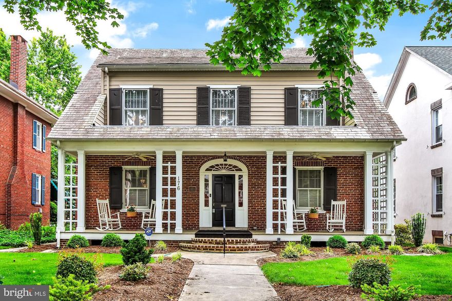 This home has been meticulously maintained during the current owners 17 years of stewardship.  It's truly a Classic Springdale Masterpiece!  A covered 36 X 8.5 ft. rocking chair front porch welcomes you upon your arrival!  Inlay hardwood flooring, beautiful mill-work, custom art rail system, solid wood doors, custom wood blinds and more await you inside.  The living room has an outstanding fireplace, custom book shelves and cabinets.  A "Springdale" corner cabinet greets you in the dining room.  The kitchen and bathrooms have been beautifully updated to maintain the integrity of the house.   The master bedroom & sitting room tower over the garden.  Enjoy a cozy evening and the sounds of water from the fountain over looking the wonderfully landscaped garden from the 11.5 X 8.5 covered rear porch.  You access the two car garage with new doors & openers from the garden path.  Wellspan and York College are just a short walk away as you travel along the shaded tree lined streets.  This home is move in ready!