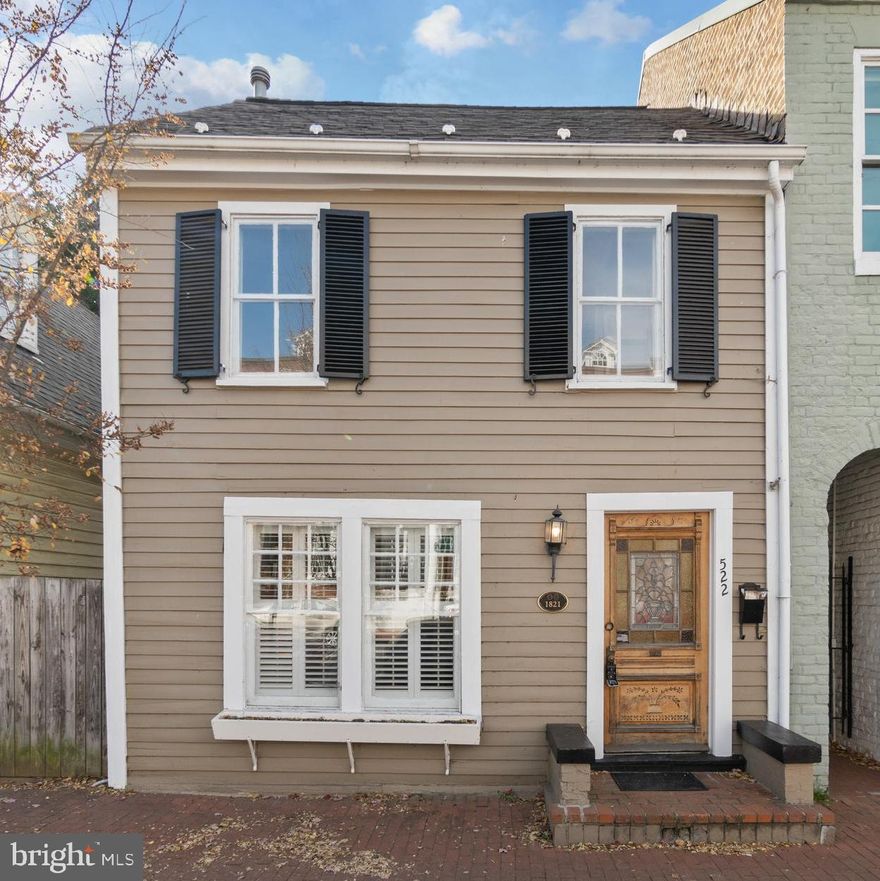 Walk into this charming 1821 two-story downtown Colonial home that has Commercial Downtown Zoning (CD) where you can start your own business, or live in this desired location. This 19th century home has hardwood floors, painted exposed-beam ceiling, plantation shutters, and gorgeous stained-glass windows throughout.  
This 1731 sqft 2 bedroom, 2 bath home has 3 wood-burning fireplaces, a kitchen with 9ft ceilings, track lighting and tile floors; Maytag stainless steel refrigerator with ice-maker and water dispenser, stainless steel stove and matching built-in microwave. The kitchen is opened to a breakfast nook that leads you into a full bath downstairs, main level washer and dryer hookups, and a bedroom that opens up into the whimsical backyard with a deck and  garden shed through sliding glass doors. Great location and walking distance to all the Fredericksburg Downtown has to offer.  Home is sold as is.  Great gem, waiting for personal touch.  

On the top of the stairs is a spacious bonus room with a fireplace, a ladder that takes you up to a loft perfect for an extra bed for guests, office space, or a clubhouse for the kids. Also upstairs is the 2nd bedroom with a full bathroom showcasing a beautiful clawfoot tub. Partial unfinished basement perfect for extra storage. This desired historic location is within walking distance the trian to take you to DC or Richmond. Also walk to restaurants, shopping, parks and much more. This gem is waiting for your personal touch! Home is sold “As-Is”