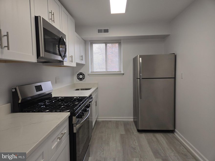 REMODELED AND MOVE IN READY.  Brand new Kitchen with all new appliances.  Two-bedroom condo.  Gound Floor.  Very convenient to all major commuter routes and transportation.