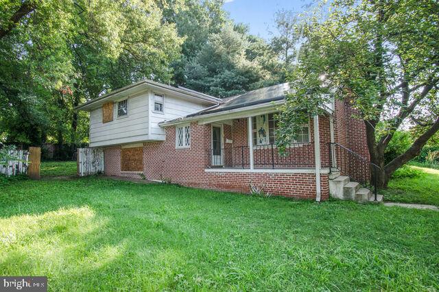 Rehab Ready! This 2 level ranch style home sits on a wide corner lot. Currently configured as 4 bedrooms and 3 full bathrooms, a full living room and separate dining room, and offers a full basement with tall ceilings. A perfect opportunity resides here for an experienced investor or anyone searching for a complete renovation project. Sold as-is.