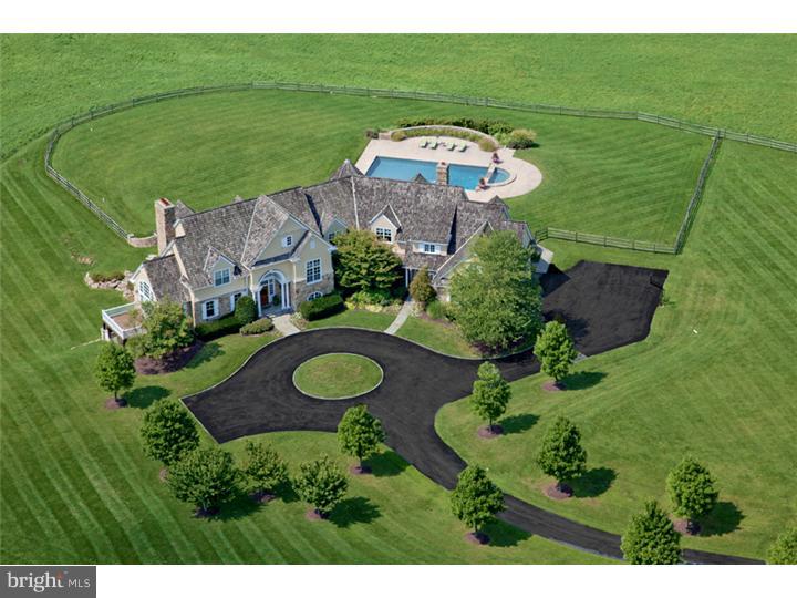 Handcrafted by Hallowell Construction with a respect for Main Line traditions & a real understanding of the needs of today's families, this grand Estate Home is both impressive and inviting. Exceptionally fine materials and design features create a grand setting for formal entertaining, while the home's fitness and game rooms, bar and wine cellar, lounges and verandas invite relaxation. The attention to detail goes beyond the residence itself and extends to the entire property. From the landscaping, terraces, pool and spa, this property reflects a philosophy that a spectacular home must satisfy its owner from every vantage point. The panoramic views of the legendary Ardrossan Farm afforded from nearly every room are truly breathtaking, and reflect the genius of Visich Architects design. And the residence provides convenient access to Center City Philadelphia & all major transportation routes, offering the very best of both town and country. If settlement occurs before 2/14/14 a 2 year lease of a Bentley Continental GT Convertible from F. C. Kerbeck is included in the sale for the buyer.