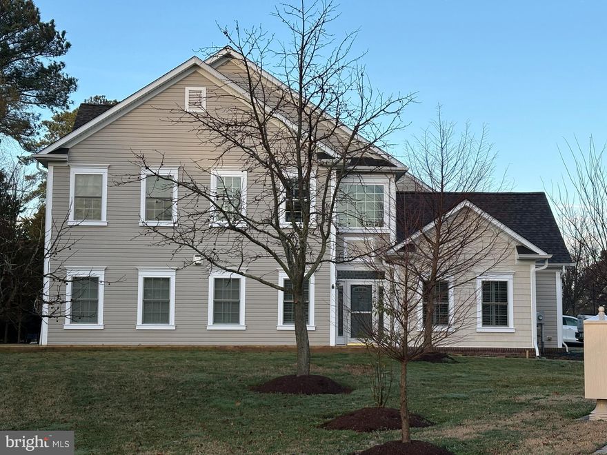 Enjoy the Solomons waterfront lifestyle in this Windward Harbour at Solomons townhome featuring main-level living and conveying with a deeded boat slip (Pier C, Slip #1). Rare opportunity in Windward Harbour at Solomons! This beautifully maintained townhome offers quick access to the Patuxent River and Chesapeake Bay and is just minutes from Solomons’ waterfront restaurants, shops, and local attractions.  The thoughtfully maintained and updated layout includes a main-level primary suite with an updated en-suite bath featuring a beautifully tiled shower with glass doors, along with an additional bedroom or office on the main level.  Upstairs offers two additional bedrooms, a full bathroom, and a loft area providing flexible living or workspace. A finished bonus room over the garage adds additional space for guests, hobbies, or storage.  Recent updates include luxury vinyl plank flooring, fresh paint, updated lighting and fixtures throughout the home, plantation shutters, and an updated kitchen with quartz countertops and newer appliances. Major improvements include thermopane windows (2023), new 50-year shingle roof (2024), new gas furnace (2024), new gas water heater (2024), and a new deck (2025).
The garage has also been thoughtfully upgraded with Muscle Tech flooring, fresh paint, storage shelving, and workbench that conveys with the home. The home is also wired with a generator lockout kit for added convenience and peace of mind.  Life here feels like being on vacation every day!  After a long day at work, hop on your boat and cruise to dinner, enjoy waterfront views, or watch the sunset under the Solomons Bridge.  From home to boat in minutes.  Deeded boat slip. Water access. Solomons waterfront lifestyle. Professional pictures to come 3/18.