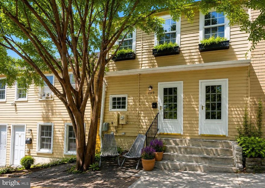 ****Professional photography will be uploaded by the end of day on Thursday, 5/21!****  
This charming 2-bedroom, 1-bath, RARELY available, partial brick row-home has been freshly updated with new paint throughout, brand-new carpeting, a new dishwasher, and a new fence being installed at the end of May (pending any delays). Located in the heart of Historic Oella, the home is just steps from Patapsco Valley State Park and within walking distance to the Mill Race Trail, The Breadery, Hallowed Ground, and Old Ellicott City with its beloved shops, restaurants, and historic charm.

Surrounded by the sounds of nature, the home blends comfort and character with a cozy wood-burning fireplace, patio access overlooking the quaint mill town, and a finished lower level leading to lush gardens perfect for spring and summer enjoyment. Please call Kristin Lee for any questions regarding this property!