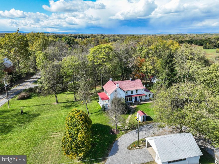 **Charming 1900 Farmhouse for Sale**

Step into this delightful farmhouse built in 1900, where historic charm meets modern convenience. This beautifully preserved home features four spacious bedrooms and two bathrooms, offering a generous 2,470 sq. ft. of above-grade living space, perfect for families or those seeking extra room.

As you enter, you'll be welcomed by stunning hardwood floors that flow throughout, creating a warm and inviting atmosphere. The recently updated kitchen, complete with new appliances, is a joy for any home chef, ensuring you can prepare meals with ease.

Situated on 1.67 acres of land, this property provides ample outdoor space and includes several outbuildings that present excellent opportunities for shop space or additional storage. There are no restrictions on usage, allowing for versatile options to maximize your investment.  

Recently updated with mini-splits for heating and cooling in many of the rooms! New water heater. New Washer and Dryer convey. New Kitchen appliances convey. Being sold as-is. 

Don’t miss your chance to own a piece of history while enjoying the comforts of contemporary living in this unique property!