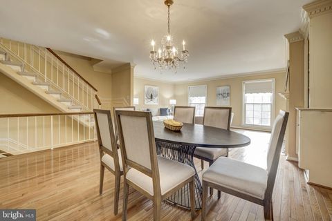 Photo of 10902 Wickshire Way #F, ROCKVILLE, MD 20852 (MLS # MDMC2225804)