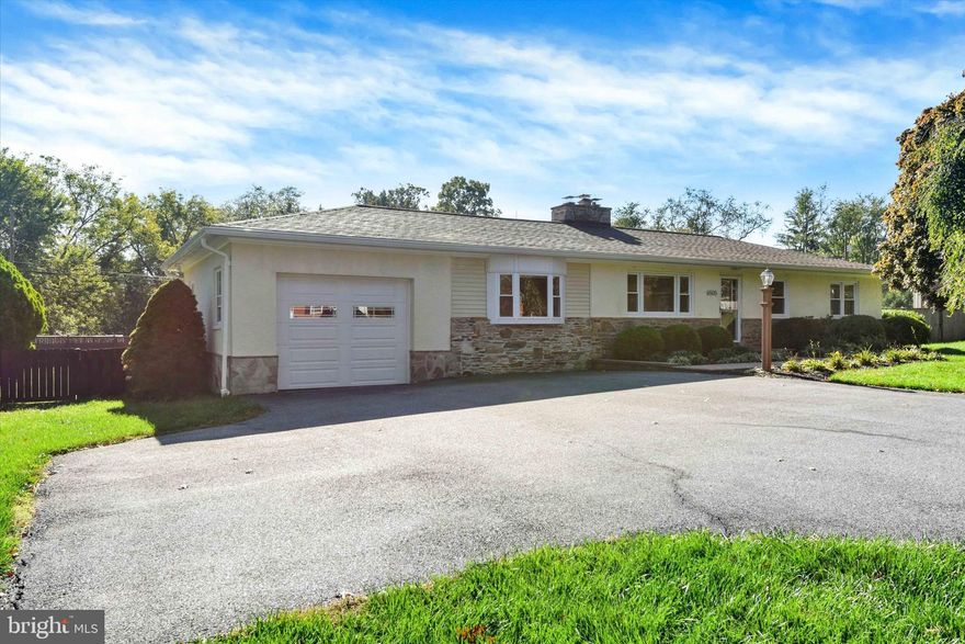 WELCOME HOME to this beautifully updated RANCHER offering 3 bedrooms and 2 full baths, perfectly situated on a half-acre, well- manicured lot with a large inground pool and storage shed.  The gourmet kitchen--renovated about 3 years ago features granite countertops, stainless steel appliances, induction oven/stove and modern finishes designed for both everyday living and entertaining.  Enjoy two fireplaces, one on the main level and another in the basement.  The finished walkout basement includes a spacious family room, bedroom and a full bath, ideal for guests or extended family.  Hardwood floors, updated bathrooms, and thoughtful care throughout make this home truly move-in ready.   Step outside to a beautiful deck accessible from both the kitchen and the family room, overlooking the level backyard.  Additional highlights include a one car garage with abundant workspace and built-in workbenches which provides the perfect setup for hobbies, storage or projects.  As an added bonus, this home comes with a brand-new hot water heater (January 2025) and a home warranty for extra peace of mind.  This home is the perfect blend of comfort, function and style-ready for you to move right in and enjoy!