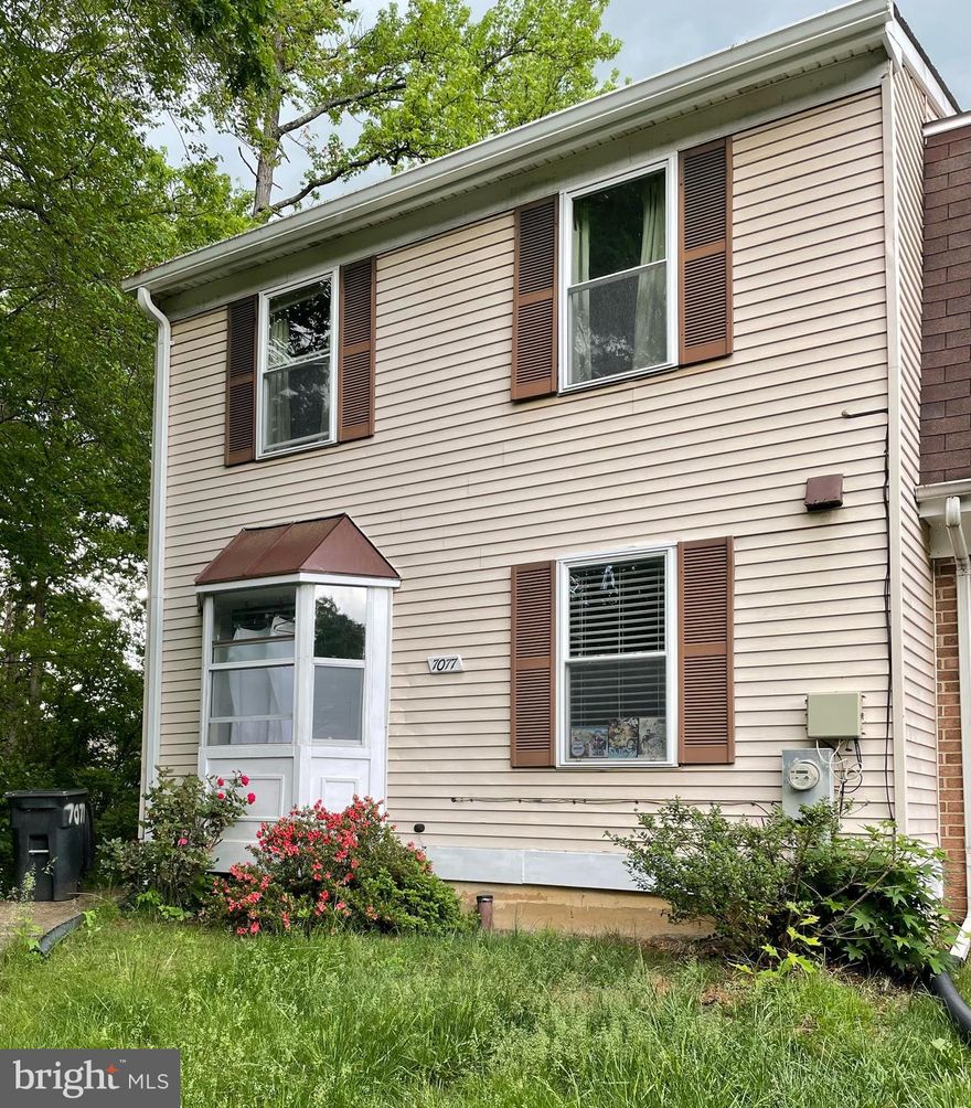 Ready to move into this well-maintained 3 level, 3 bedroom, 2 full and a half bath townhome. The End Unit provides more windows and privacy. The main level features a kitchen with table space, stainless steel appliances. Separate dining room w/ bay window. Upper level there are 3 Bedrooms and 2 bath, with beautiful wood floors throughout. In the walkout basement, there is a laundry room, a family room (11.5 X 20), and a study room ( 10 X 10).