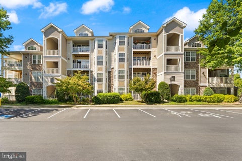 Photo of 502 Sunset View Terrace SE #104, LEESBURG, VA 20175 (MLS # VALO2136182)