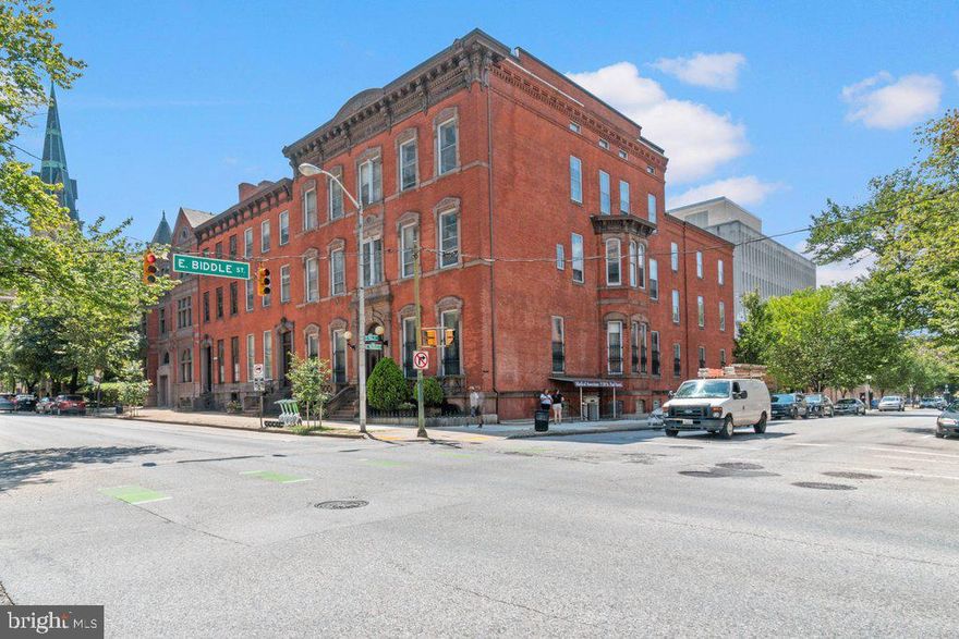 Unit 3 spans 3,571 sq. ft. across 16 rooms and two half baths, presenting an exceptional opportunity for medical, wellness, or professional users seeking substantial space in Baltimore City. With a private entrance from Biddle Street and a layout originally designed for a physical therapy practice, the suite already functions well for exam rooms, consultation offices, or treatment areas.

The configuration supports both private and collaborative use, offering smooth flow between rooms while preserving patient or client privacy. The generous footprint also lends itself to creative or hybrid live/work adaptation with the addition of a kitchen.
Monthly condo fee is $1,131.12.

Unit 3 connects internally to Unit 1, creating approximately 5,508 sq. ft. of contiguous space with multiple exterior entrances — ideal for a growing group practice, multidisciplinary clinic, or owner-user seeking a large, customizable environment within historic Mount Vernon.

The History

What began as a small physical therapy office in the lower level soon grew to meet rising demand. As the practice expanded, additional rooms were added to accommodate more patients, staff, and specialized treatments.

The doctors maintained their private offices in the parlor-level suites above, where they met with patients for long-term care planning, welcomed medical representatives, and collaborated with fellow physicians. Together, the connected spaces evolved into a cohesive professional environment — purpose-built for care, collaboration, and growth — while preserving the elegance and architectural presence that define Mount Vernon’s historic townhouses.
