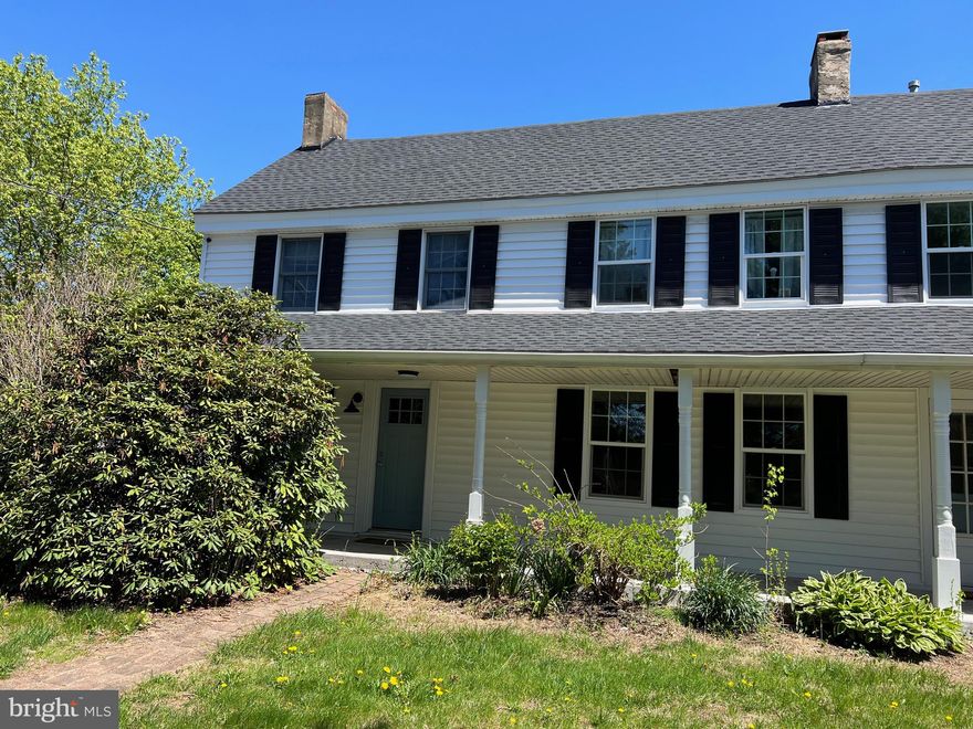 Freshly painted  2 bedroom 2 bath colonial in the village of Ottsville.  This charming twin home features long covered front porch, with all new windows. Interior has been completely refreshed with refinished hardwood floors, fresh paint throughout. Bathrooms are fresh and clean with all fixtures. Large eat in country kitchen with walk in fireplace and wood beamed ceilings. Master suite with vaulted ceilings, walk in closet, and full bathroom.  Main floor laundry and mud room for convenience. Private rear deck with back yard. Walk across the street to the coffee house Brig o Doon and the Ottsville Inn! Interior photos coming soon.