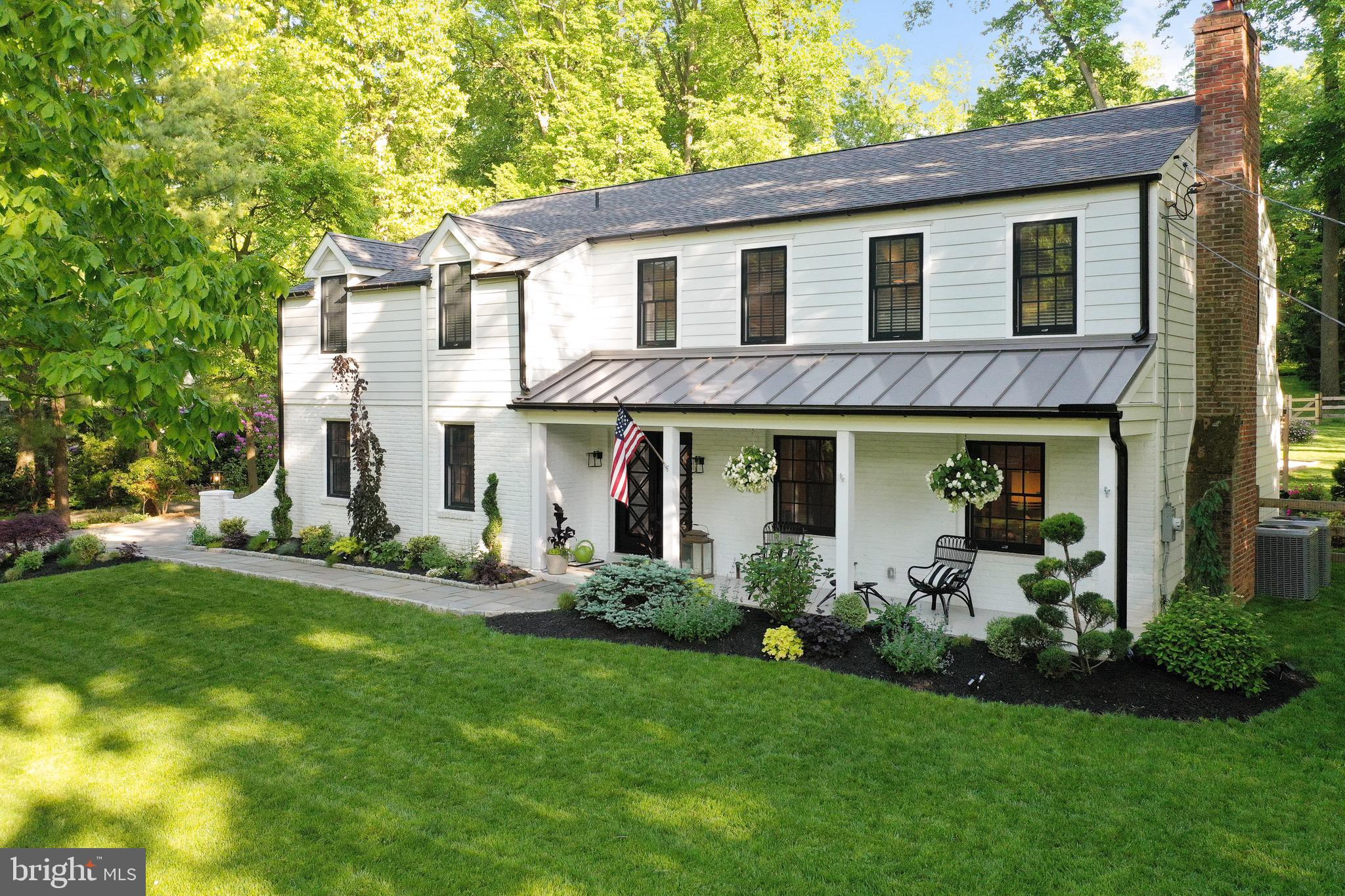 *Do not miss the video tour* The Modern Farmhouse meets The Main Line! This absolutely stunning, perfectly styled five bedroom house was completely renovated down to the studs 3 years ago to include an addition, creating total perfection. Located in the award-winning Tredyffrin Easttown school district, this sprawling Wayne neighborhood with mature trees and large lots is one of the best elements of the total package being offered here. The mix of modern and traditional styles is perfectly balanced, and the open floor plan is perfect for daily living and entertaining. The black glass and iron custom front doors will grab your attention as you walk the flagstone walkway lined with professional landscaping and Belgian block. Inside, the kitchen and family room open into a large welcoming area with 2 fireplaces - a new gas fireplace in the family room and a wood burning fireplace in the kitchen eating area. The 3rd wood burning fireplace is in the living room. The Kitchen is incredibly well styled and current, as well as functional. The entire back wall of the house is lined with lower cabinets for storage. Along the same wall is a Thermador range with duel oven and griddle flanked by custom floating shelves hung with industrial cables which offer additional storage space. The kitchen also has heated floors, and a Thermador tower refrigerator and freezer. The bar area has refrigerator drawers, Mielle built-in coffee machine, tall wine refrigerator, and a large well hidden walk-in pantry. The large island with quartz tops provides seating for five. The kitchen eating area and fireplace sit in front of french doors which open out to the completely redone screened in porch with vaulted ceilings, new concrete floor and TV hook up. Off of the kitchen is the ultra functional home office/desk area, mudroom, laundry room and powder room. On the right hand side of the house is the living room with a wood burning fireplace and dining room with french doors which open out to the backyard. Up the open staircase are five bedrooms. The Master bedroom has vaulted ceilings with shiplap accents and a brand new dressing area, with make-up space, two walk in closets and a wall of shoe storage. The Master Bath has a freestanding tub, heated floors, steam shower and private commode. There is also a junior master suite with vaulted ceilings and an additional full bath with penny round tile, a seamless shower door and double sink. The remaining 3 bedrooms are nicely sized and share the hall bath with double vanity with marble tops and heated floors, upscale glazed tiles and plenty of space for multiple people to use this space. Finishing out this perfectly planned interior is the fully finished basement, with wet bar and bead board ceilings. Outside, the screened porch feels like an extra living space with the TV, comfy sofas, and eating area. The oversized, detached two car garage features 10 foot ceilings and its own sub-panel, and is set for plumbing as the 621 sq foot space above the garage is great unfinished space which could be a living quarters, hang out room, workout room or office whatever you desire! This Main Line Dream house has it all: professionally landscaped, large flat backyard with fire-pit, new roof, extra-wide gutters, all new windows, brand new dual zone HVAC, and an ADT Security system. Located in Colonial Village, a neighborhood which offers organized events throughout the year, and celebrations for kids and adults (Easter, Halloween and Christmas celebrations).