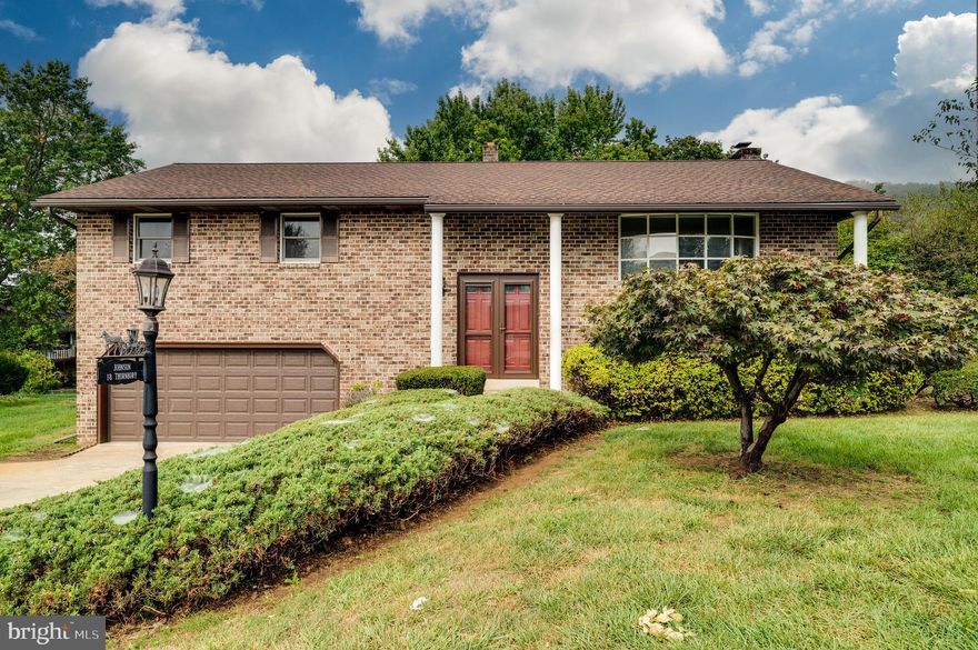 Move-in Ready Bi-Level in Exeter Township! This beautiful 3-bedroom, 3-bath home offers 2,128 sq ft of comfortable living space on a private 0.22-acre lot. 
The main level features an open-concept layout perfect for entertaining, while the lower level provides additional living space and storage. Enjoy outdoor living on the spacious deck overlooking the large, level backyard. Two-car attached garage plus additional driveway parking. Natural gas heating and central air ensure year-round comfort.
Located in Exeter Township School District with easy access to major routes. This property is priced to sell quickly. Professional photos showcase the quality throughout. Schedule your showing today - this one won't last long!