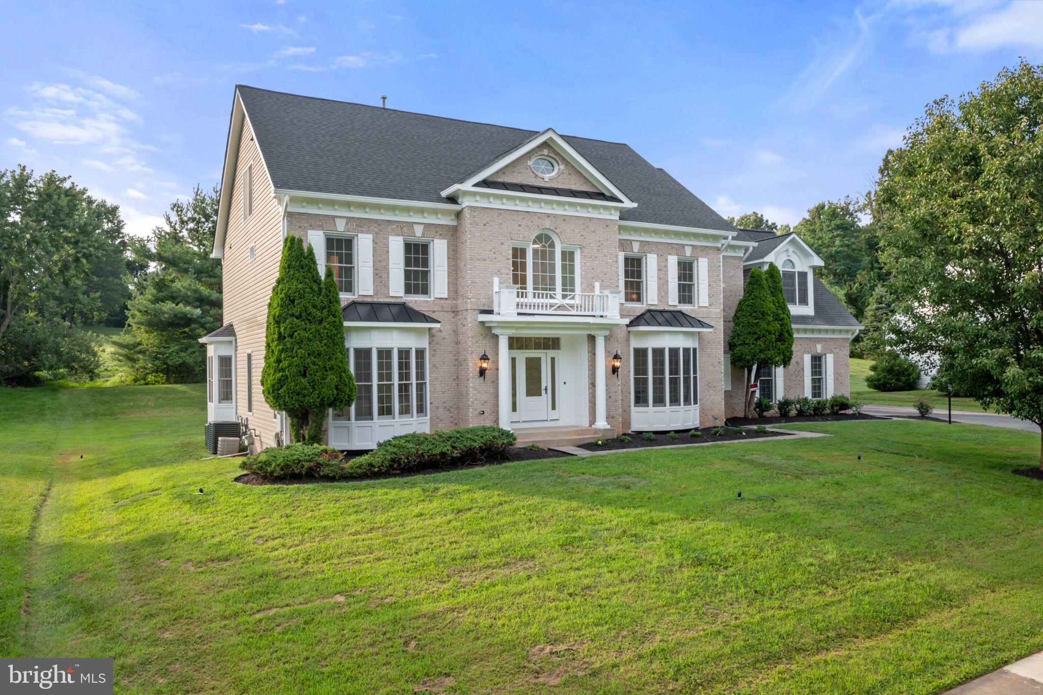 Absolutely stunning and fully reimagined with over $250K in renovations! This spacious and elegant home offers 6 bedrooms and 5.5 baths across 4 beautifully finished levels. Enjoy all-new hardwood flooring throughout, a designer kitchen with premium appliances, custom cabinetry, and sleek quartz countertops. The main level features sun-filled living spaces and a stylish powder room. Upstairs, you'll find 4 generously sized bedrooms and 3 luxurious full baths, including a massive, spa-inspired en suite with walk-in shower and double vanity. The fully finished attic adds 2 additional bedrooms and a full bath—perfect for guests, home office, or multigenerational living. The lower level has been completely finished and includes a full bath, ideal for a rec room, gym, or in-law suite. Every inch of this home has been thoughtfully updated with quality craftsmanship and attention to detail. A true turnkey gem in an unbeatable location!