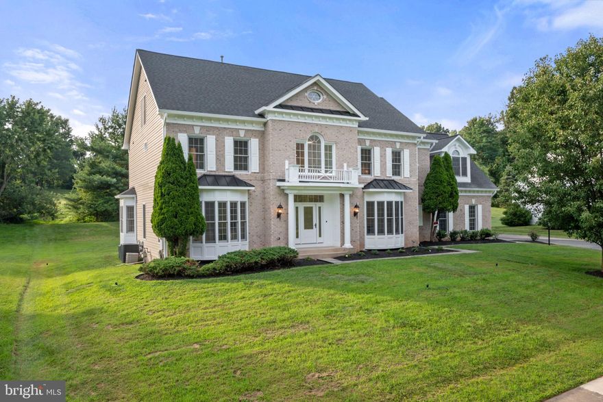 Absolutely stunning and fully reimagined with over $250K in  renovations! This spacious and elegant home offers 6 bedrooms and 5.5 baths across 4 beautifully finished levels. Enjoy all-new hardwood flooring throughout, a designer kitchen with premium appliances, custom cabinetry, and sleek quartz countertops. The main level features sun-filled living spaces and a stylish powder room. Upstairs, you'll find 4 generously sized bedrooms and 3 luxurious full baths, including a massive, spa-inspired en suite with walk-in shower and double vanity. The fully finished attic adds 2 additional bedrooms and a full bath—perfect for guests, home office, or multigenerational living. The lower level has been completely finished and includes a full bath, ideal for a rec room, gym, or in-law suite. Every inch of this home has been thoughtfully updated with quality craftsmanship and attention to detail. A true turnkey gem in an unbeatable location!