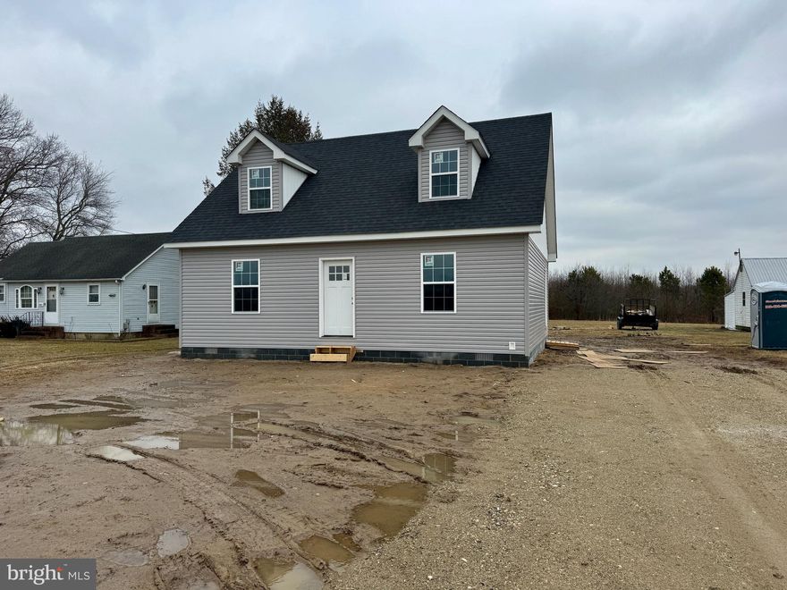 Welcome to this new construction cape cod style home in Greenwood, De. Enjoy this open floor plan with a first floor main bedroom suite with a connected bathroom & two closets, nice size living room and kitchen with stainless steel appliances package. The first floor has a half a bath for guests & a laundry closet. Upstairs you will find 2 large bedrooms with one bathroom.  This great layout has a total of 1611 sq feet. Floors will be luxury vinyl plank, carpeted bedrooms & granite countertops in the kitchen, recess lights and 4 fans throughout the home. Schedule your showing today!