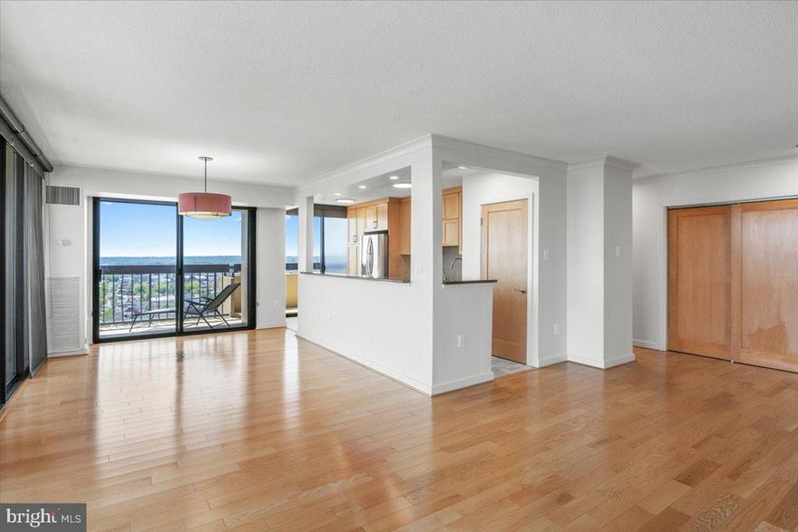 Stunning 2-Bedroom home with breathtaking Potomac River Views from every room! Truly a rare offering of a sought after floor plan perched on the 20th floor, offering unparalleled views of DC, National Harbor, direct views of the Potomac River and the vibrant southern skyline. This luxurious condo features floor-to-ceiling windows that flood the space with natural light, complemented by a expansive 81 foot wrap-around balcony—perfect for enjoying sunrise, sunsets and cityscapes and BBQ grilling allowed on your private balcony!

Key Features:
- Open kitchen concept with high-end Bosch appliances and hi
- Elegant wood flooring throughout
- Upgraded interior doors
- Updated bathrooms with modern finishes
- Excellent parking space near elevator roomincluded
- Extra storage space conveys with the unit
- 24/7 concierge service for your convenience

Building Amenities:
Enjoy a resort-style living experience with exclusive access to:
- A state-of-the-art fitness center
- A stunning swimming pool on the 23rd floor
- Party room 
- Sauna
- Sun deck with panoramic views
- Secure bike room and EV charging stations
- Cozy library and a versatile first-floor meeting/party room


Engage in a vibrant community with activities such as yoga, meditation, book clubs, progressive dinners, Friday night cocktail or mock-tail gatherings, and so much more,

Prime Location:
Ideally situated just steps away from an array of dining options, Harris Teeter (directly across the street), and Trader Joe’s (just 2 blocks away). For outdoor enthusiasts, the Potomac River and the Mt. Vernon Trail are mere blocks away. Walk to Braddock Metro. Close to National Landing, Pentagon, DC and inside beltway so commuting anywhere in the DMV is a breeze.

Don't miss the chance to make this extraordinary condo your new home!